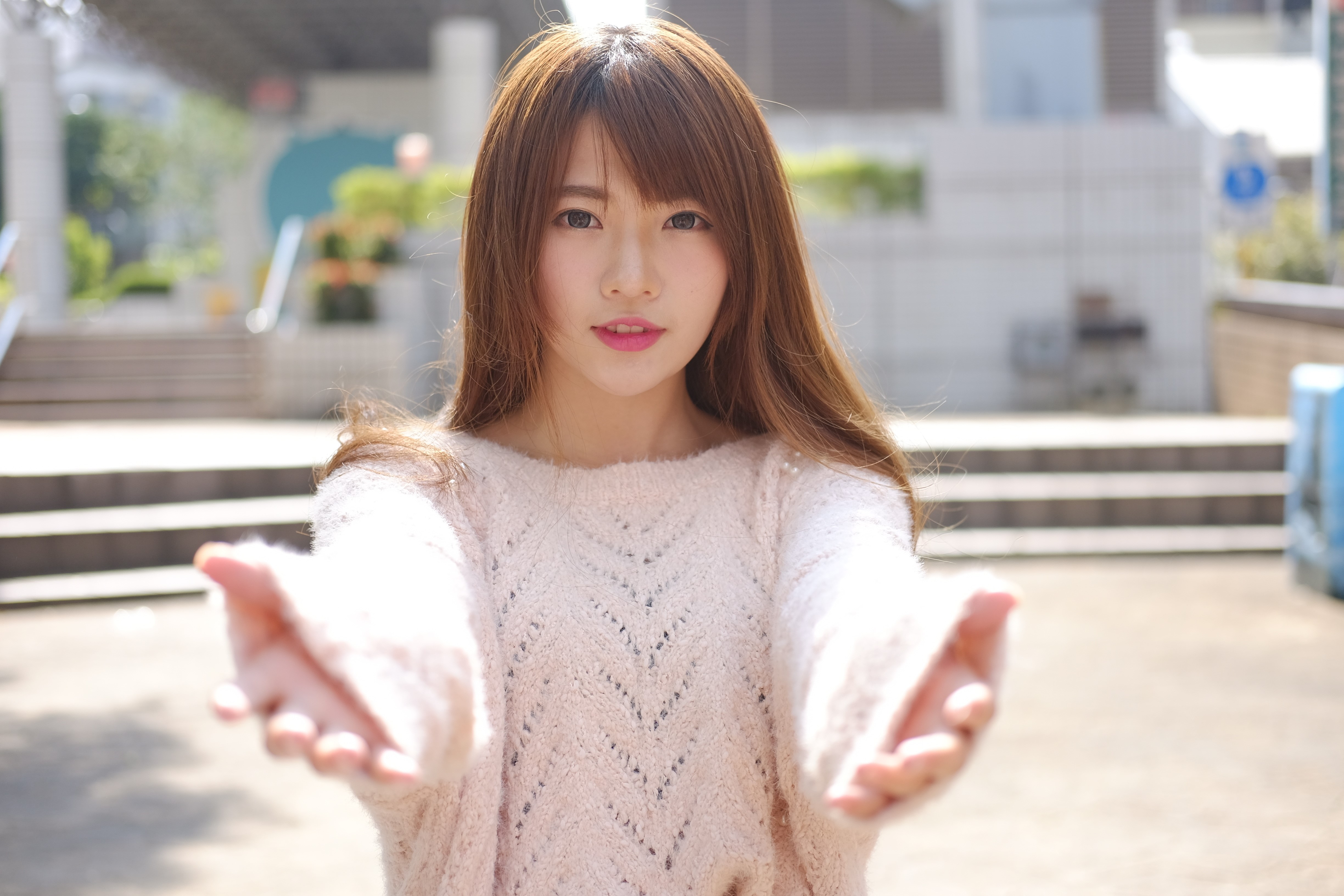 Woman in Sweater Offering Hands HD Wallpaper