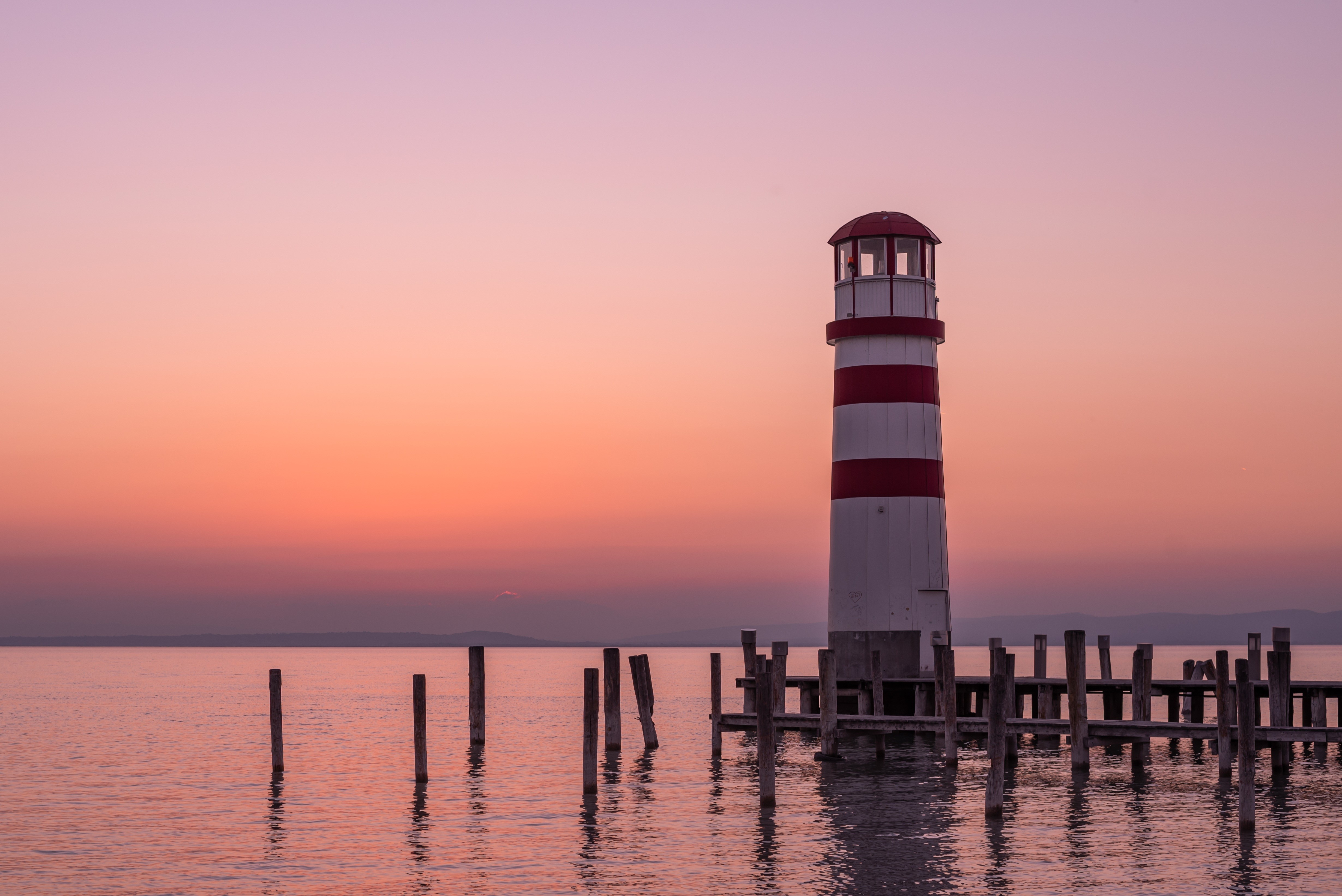 Lighthouse at Neusiedler See, Podersdorf, Austria during sunset HD Wallpaper