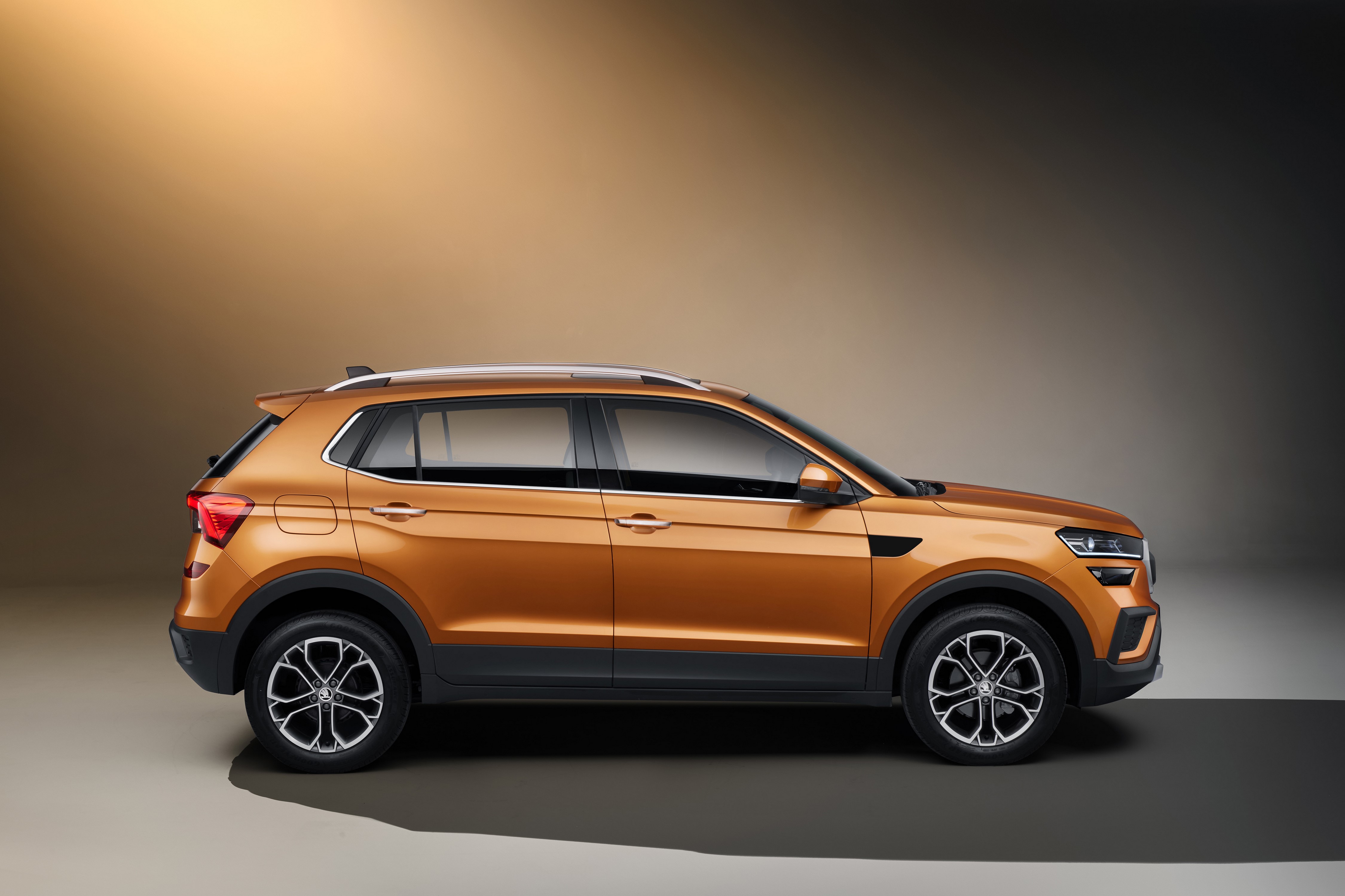 Skoda Kushaq Crossover in Metallic Orange HD Wallpaper