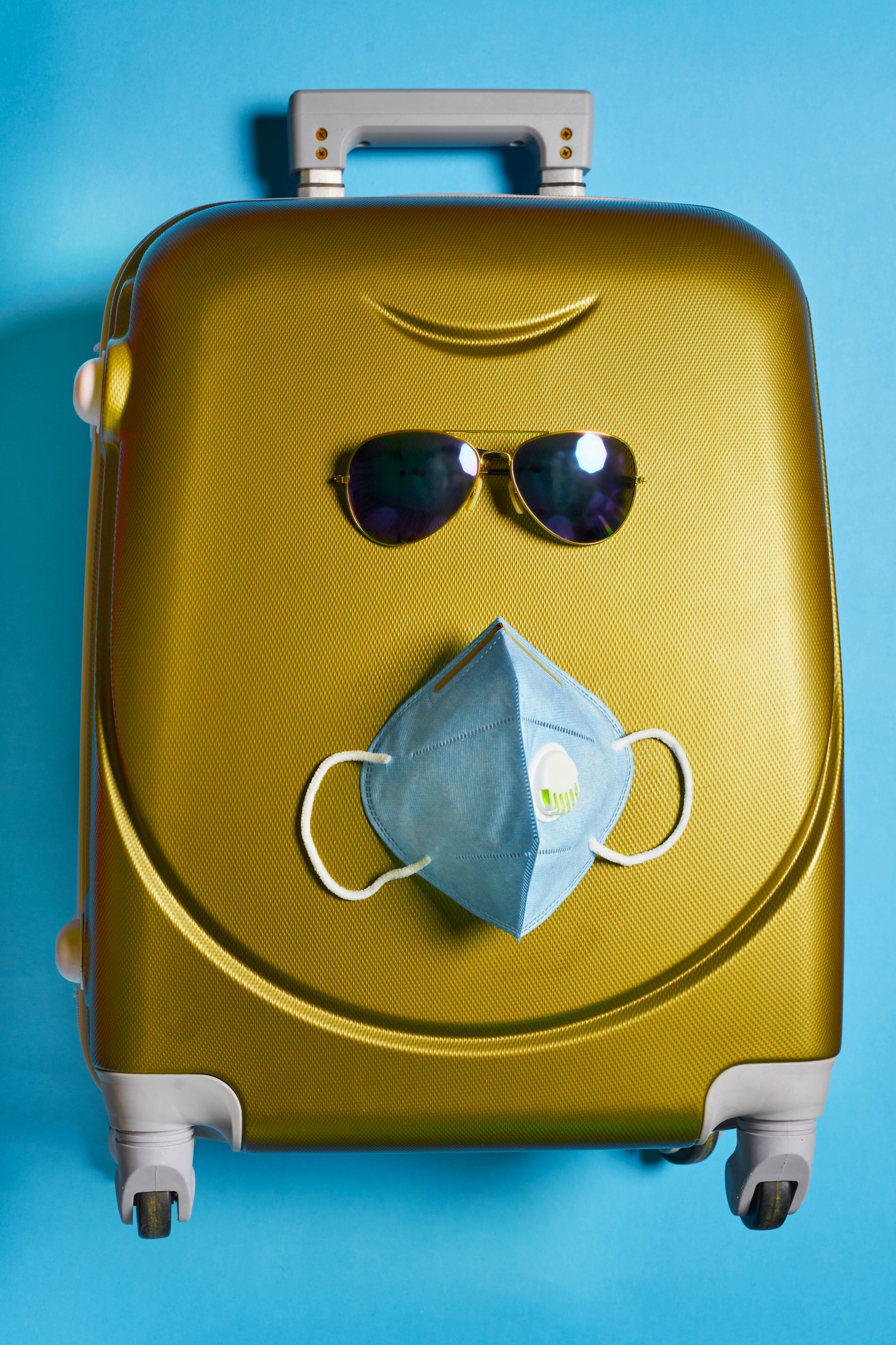 Suitcase with sunglasses and face mask HD Phone Wallpaper