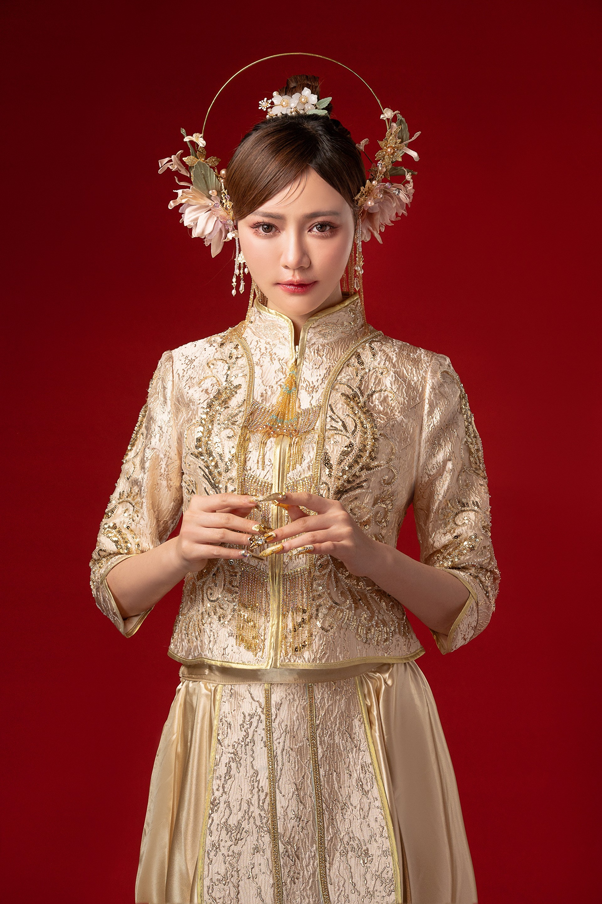 Woman in traditional Chinese wedding dress with elaborate headpiece HD Phone Wallpaper
