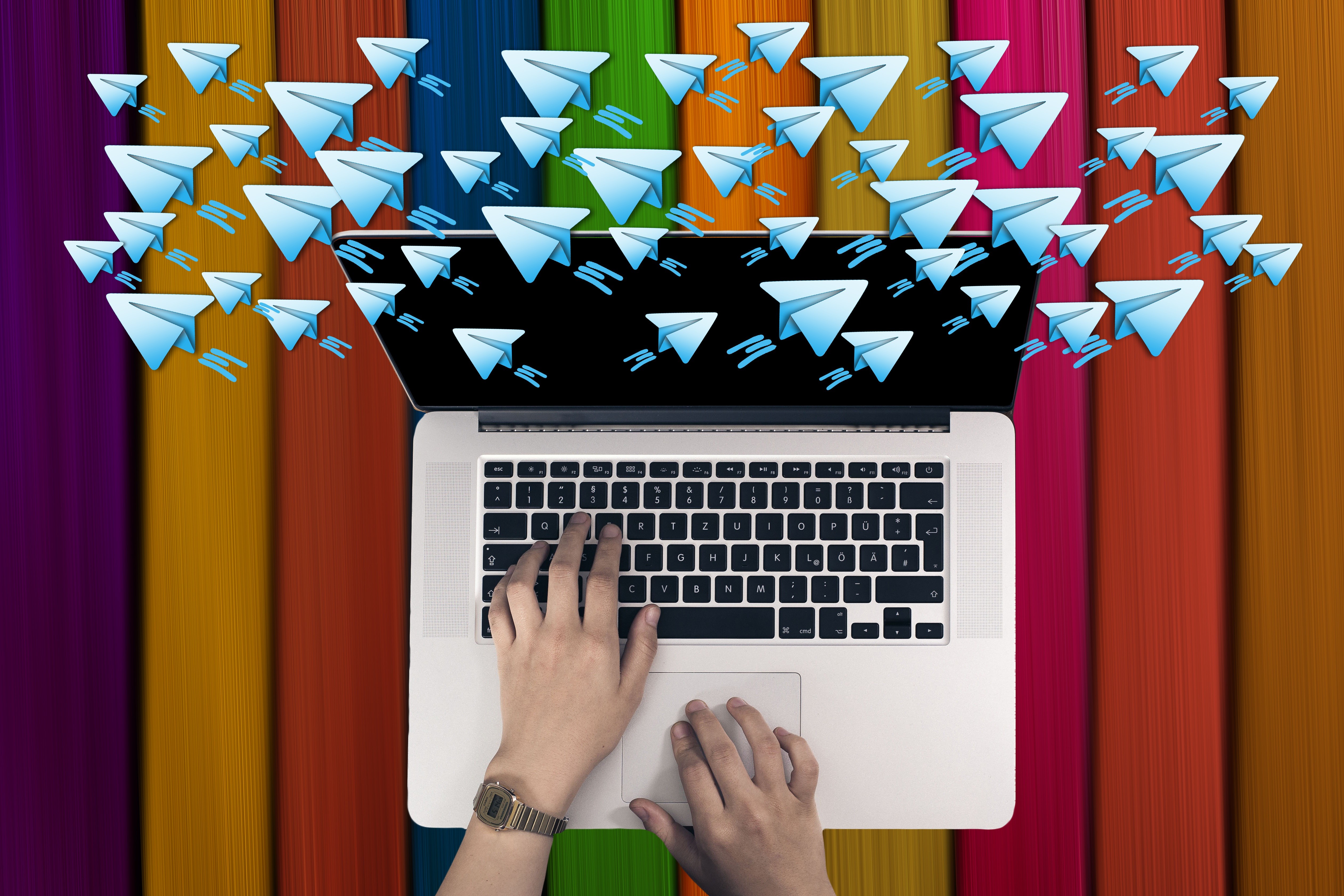 Telegram paper planes flying from laptop HD Wallpaper