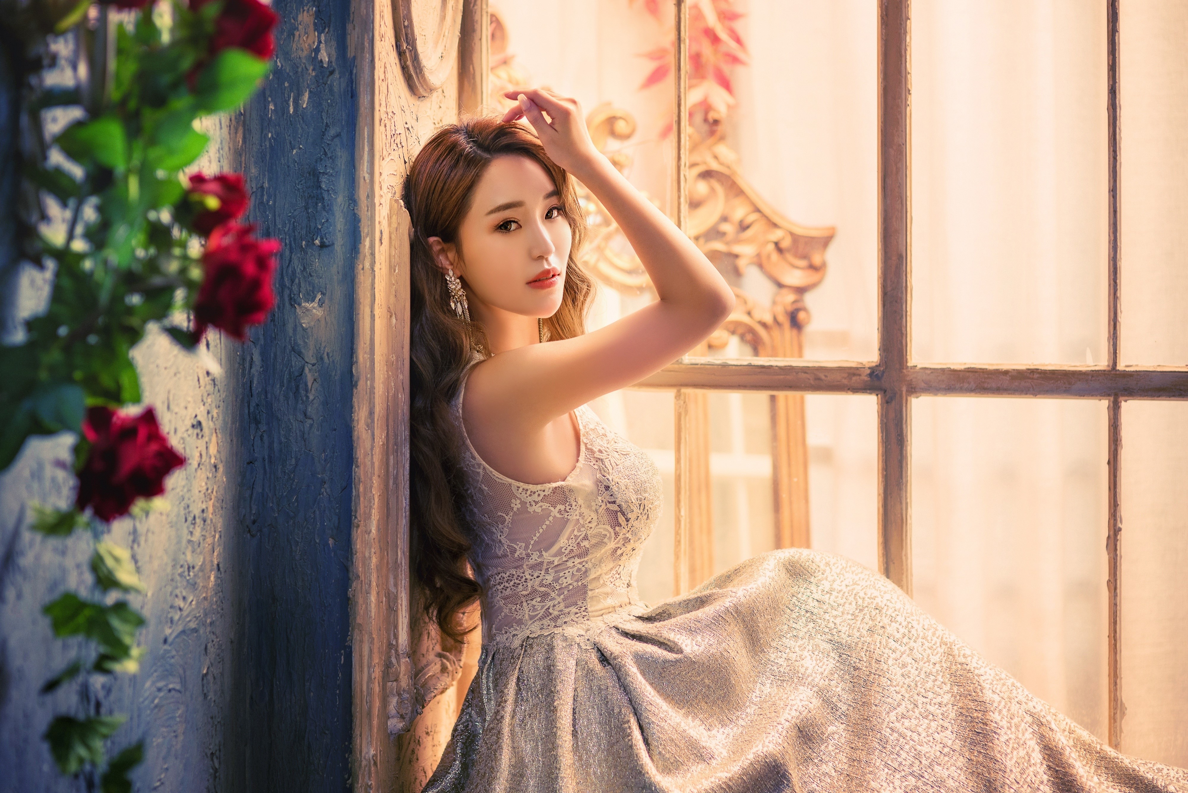 Asian woman in a dress by a window HD Wallpaper