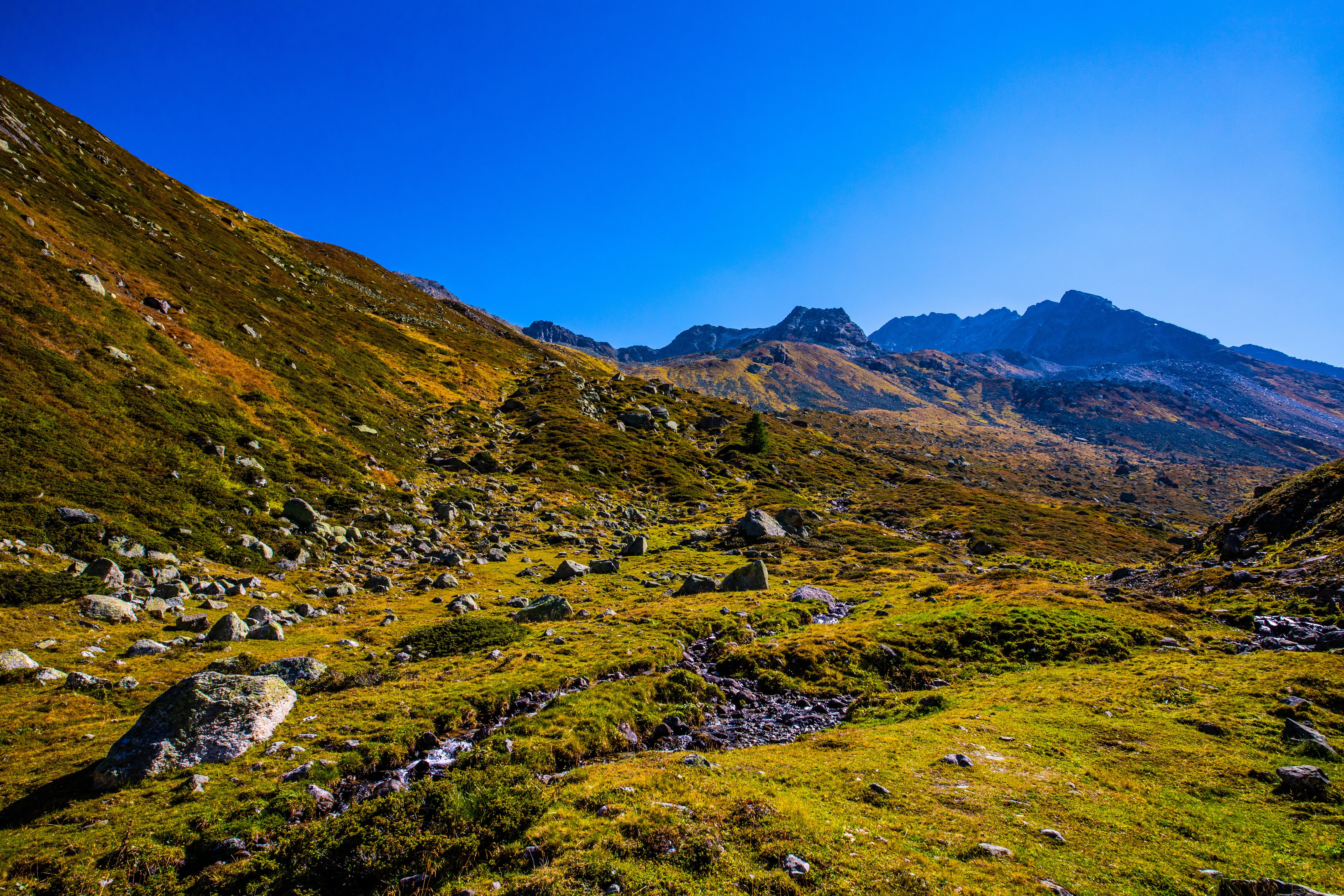 Switzerland Alps Mountains with Stones HD Wallpaper