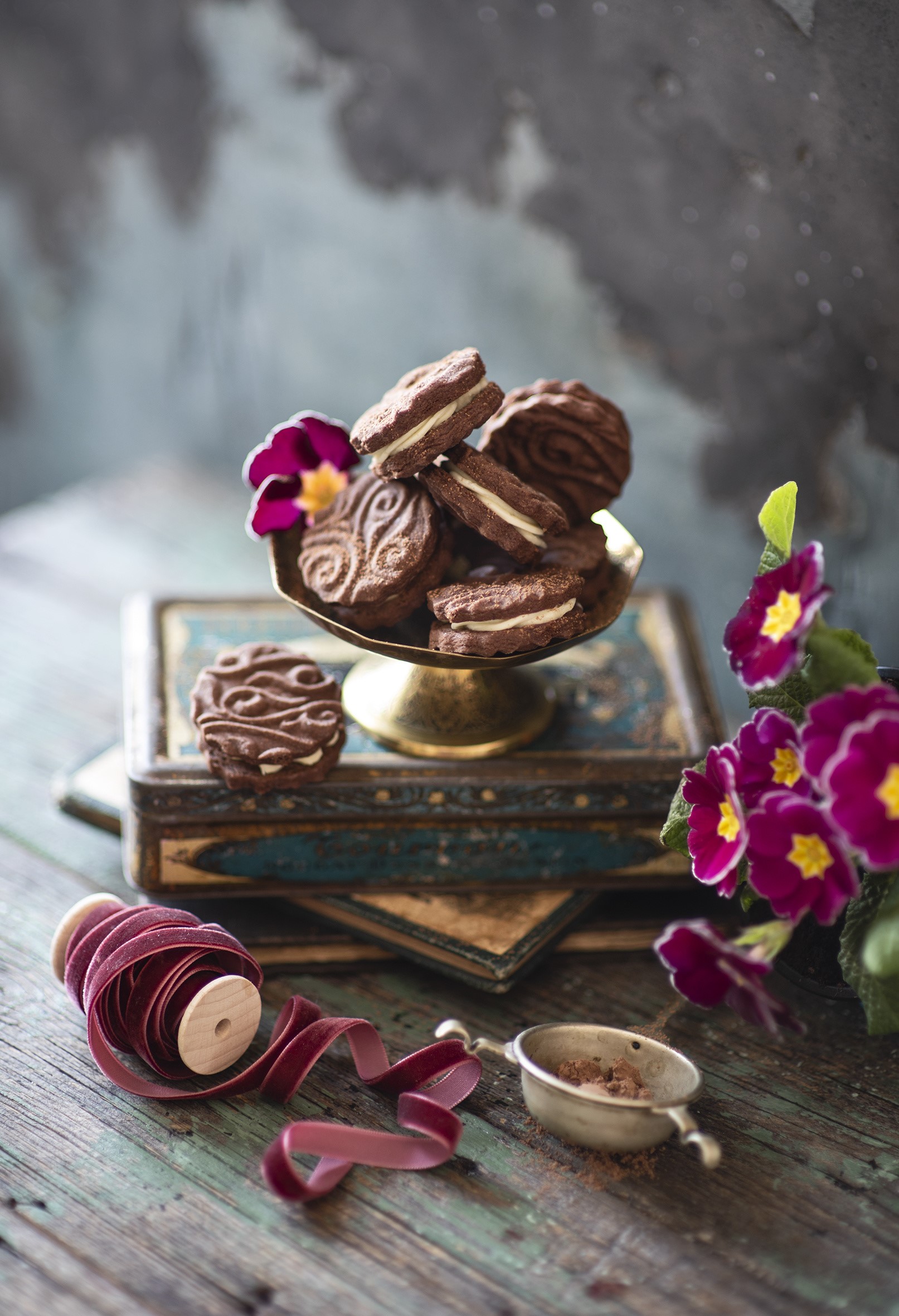 Chocolate sandwich cookies with cream filling and flowers HD Phone Wallpaper