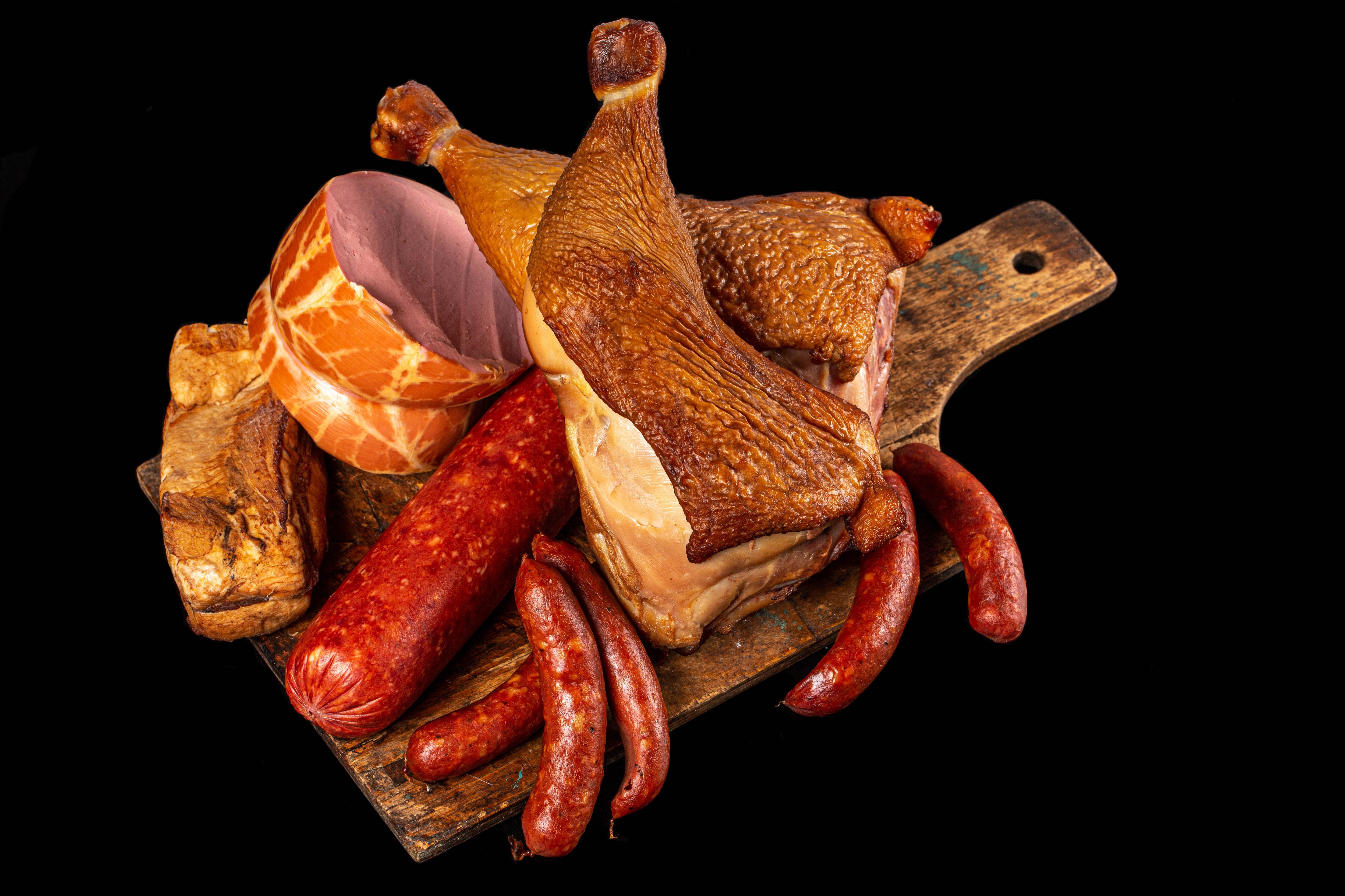 Assortment of Meats on a Cutting Board HD Wallpaper