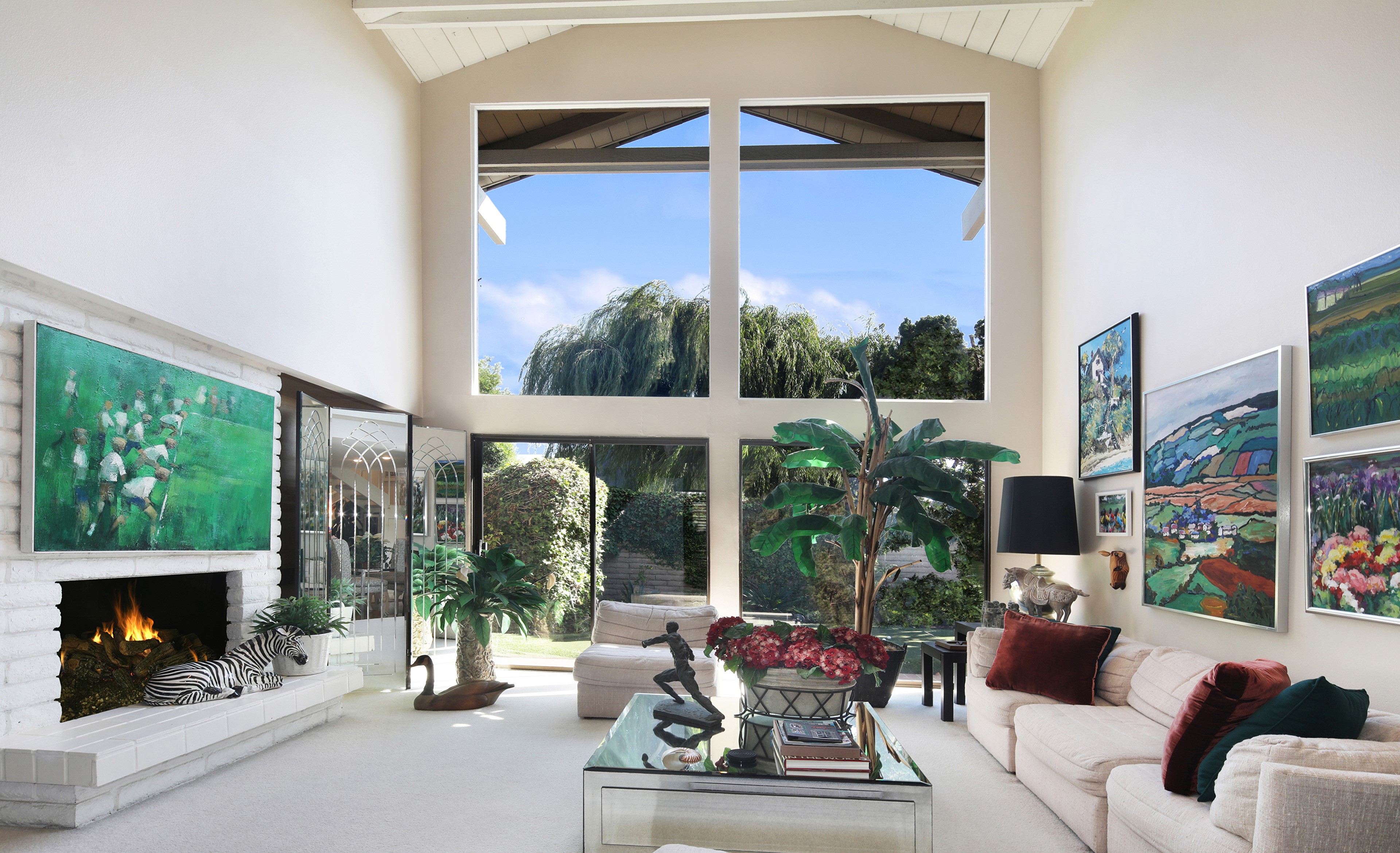 Living room with fireplace and large windows HD Wallpaper