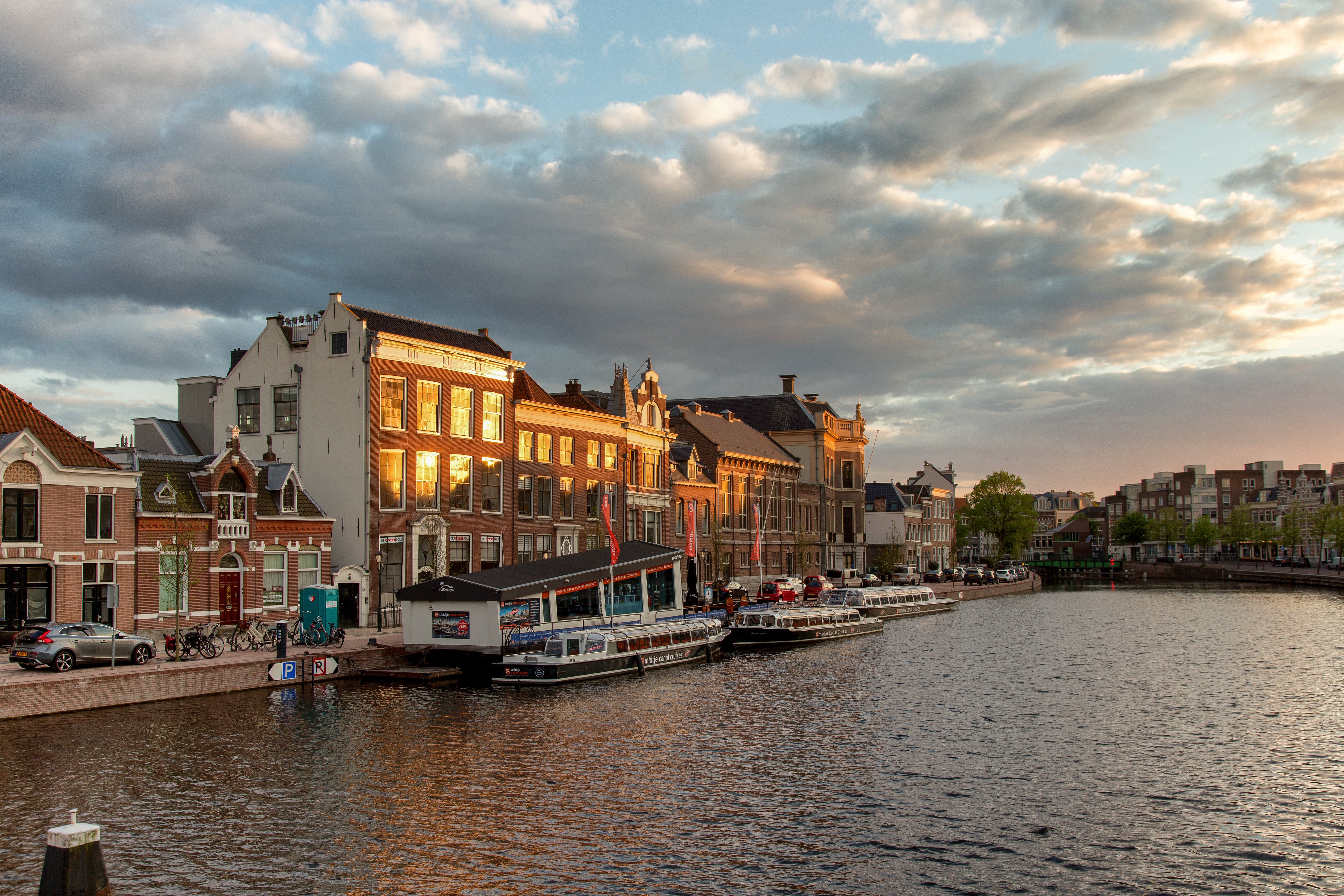 Spaarne river in Haarlem, Netherlands with riverboats HD Wallpaper