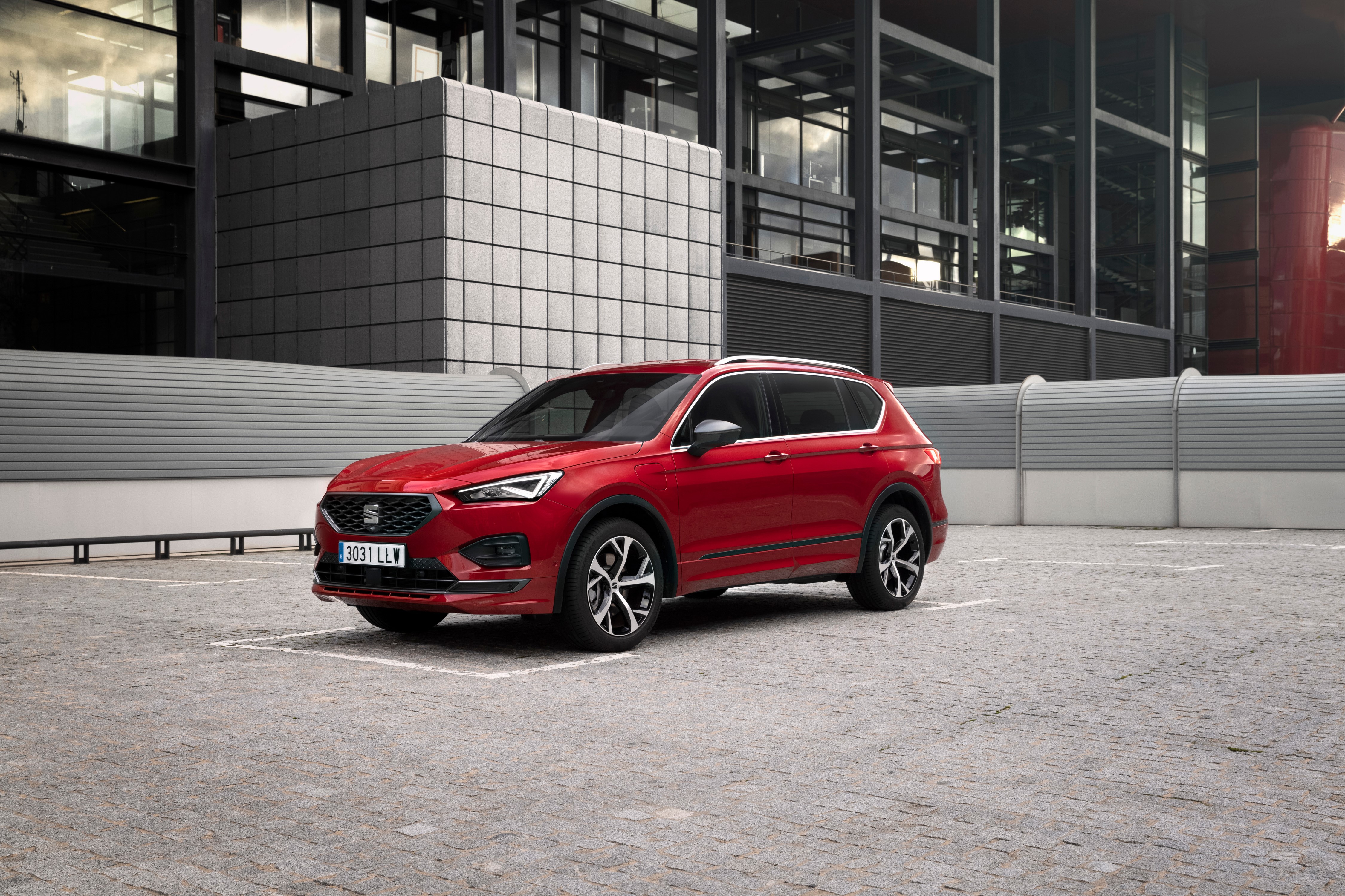 Red Seat Tarraco FR eHybrid Crossover in Parking Lot HD Wallpaper