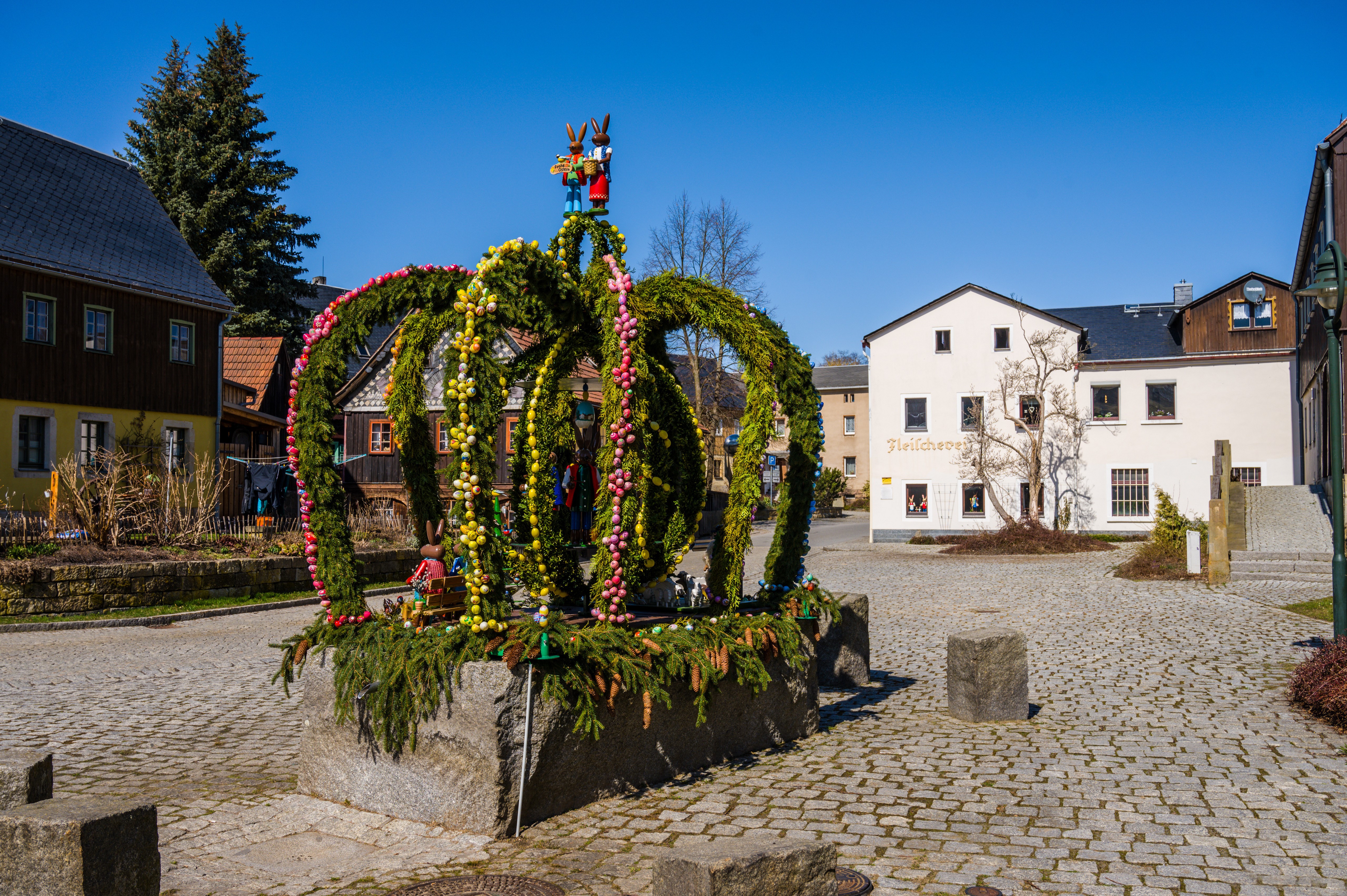 Easter fountain in Hinterhermsdorf, Germany HD Wallpaper