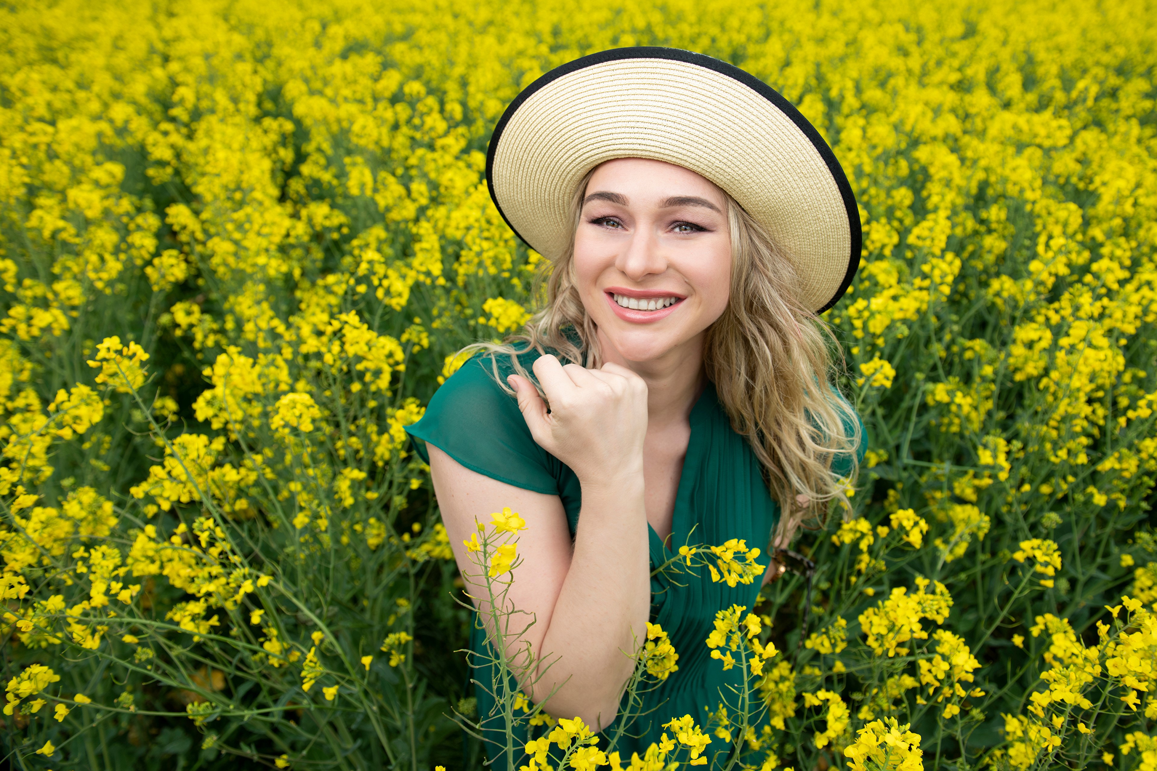 Aleksandra in a Rapeseed Field Wearing a Hat HD Wallpaper