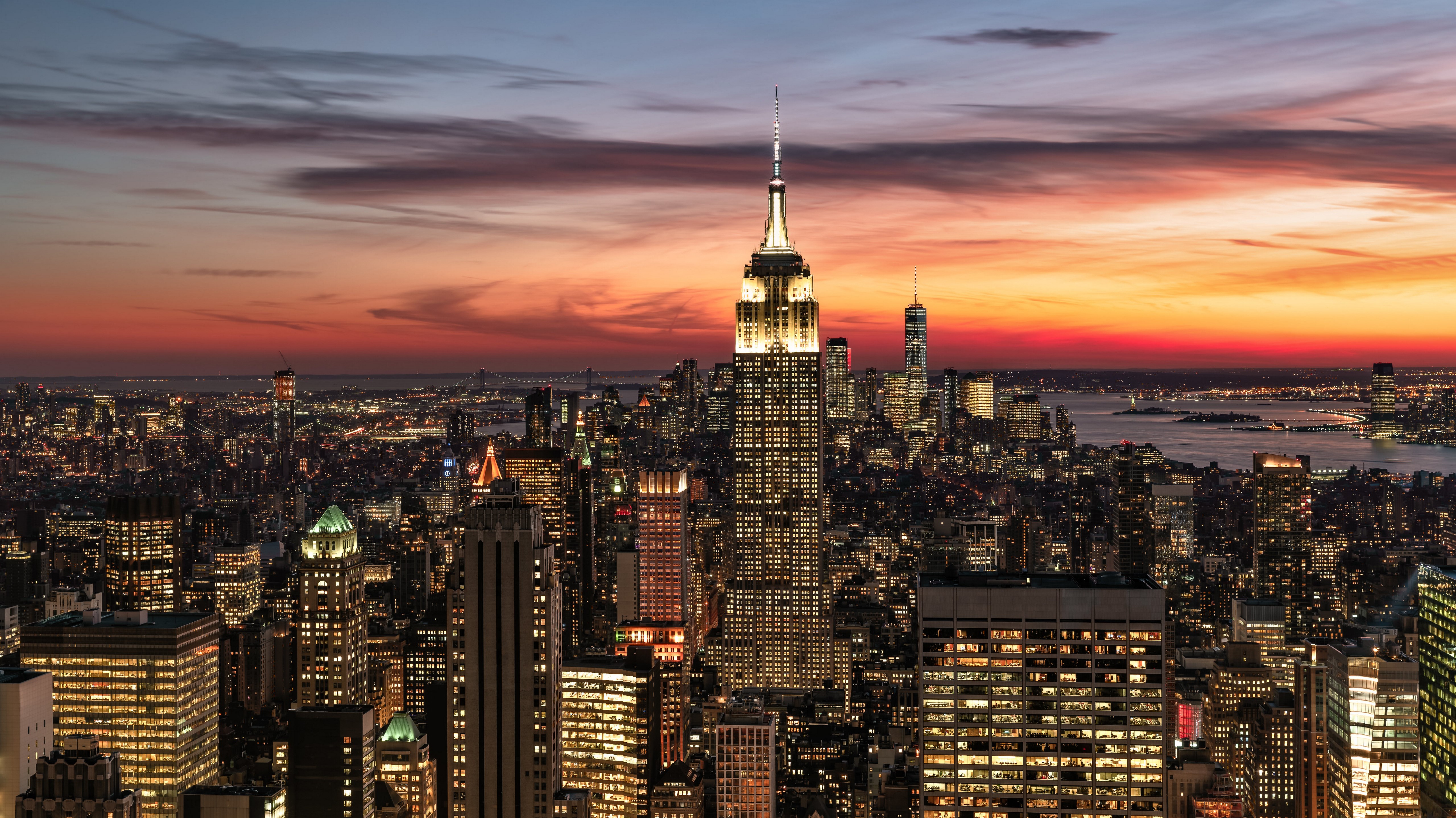 New York City skyline at dusk with Empire State Building HD Wallpaper