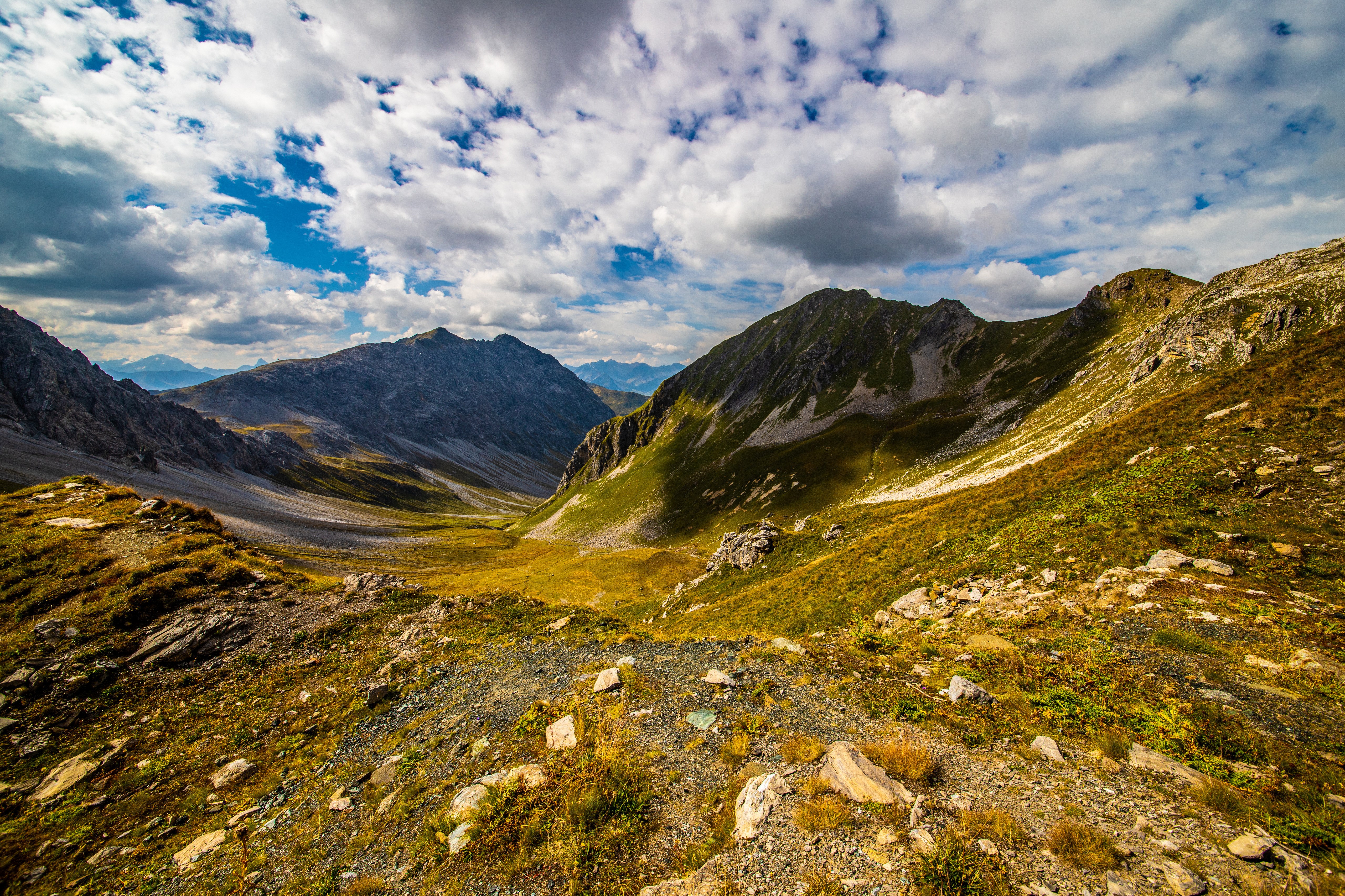 Mountains and Valley in Switzerland under Clouds HD Wallpaper
