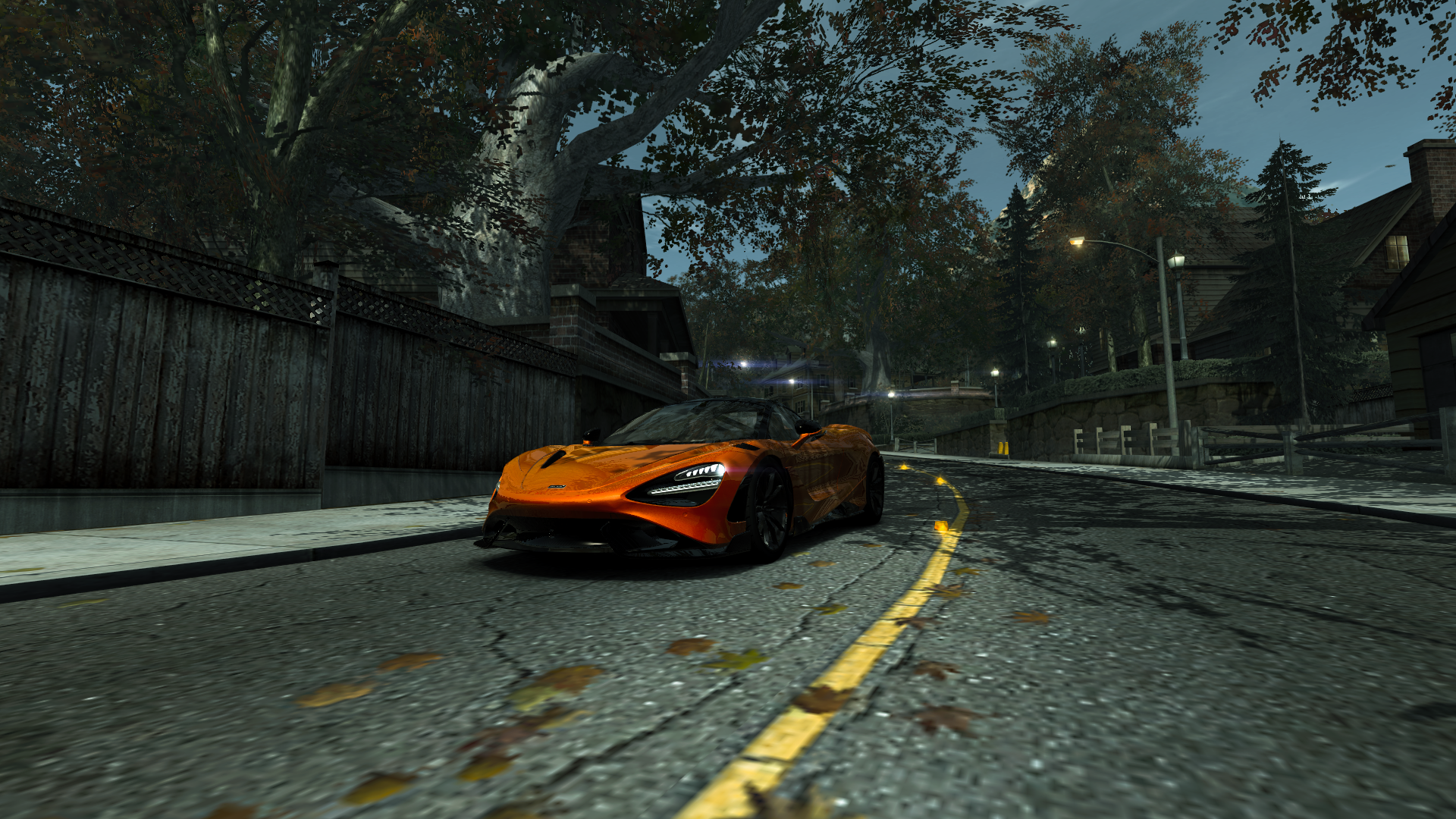 Orange McLaren 720S Spider driving on a street HD Wallpaper