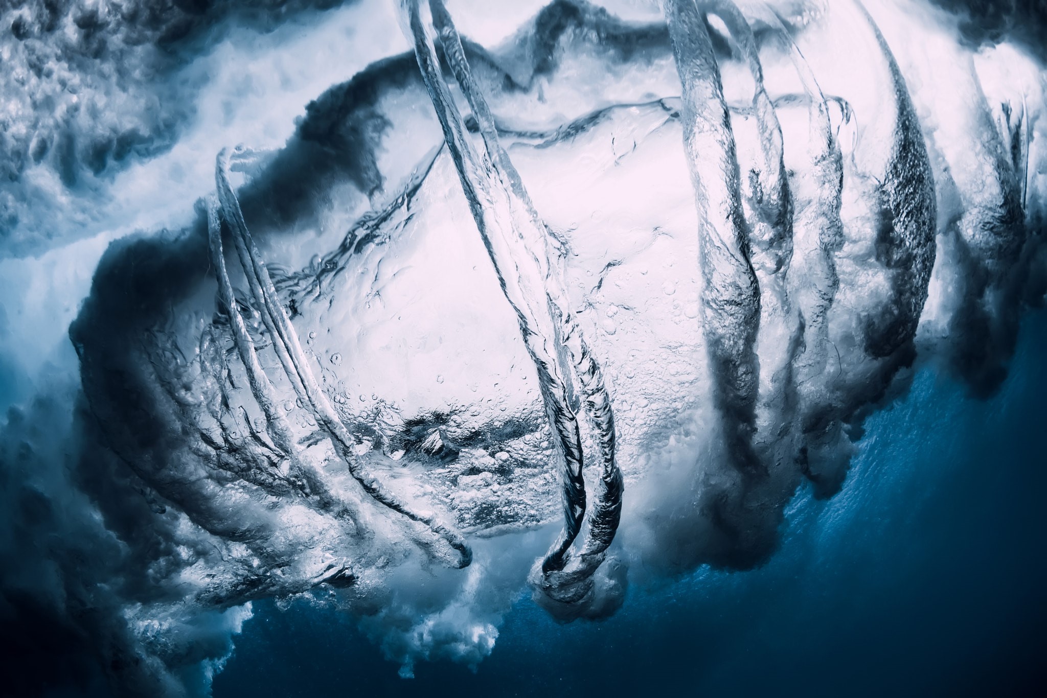 Underwater view of swirling ocean waves HD Wallpaper