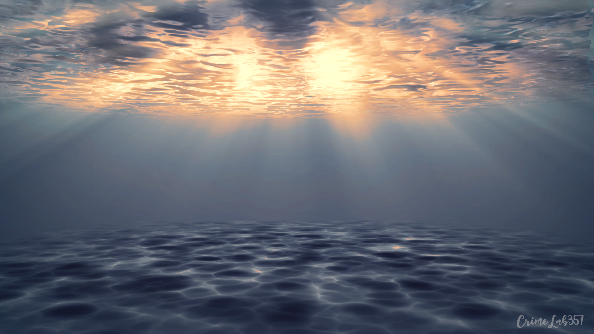 Underwater view of sunlight filtering through water HD Wallpaper