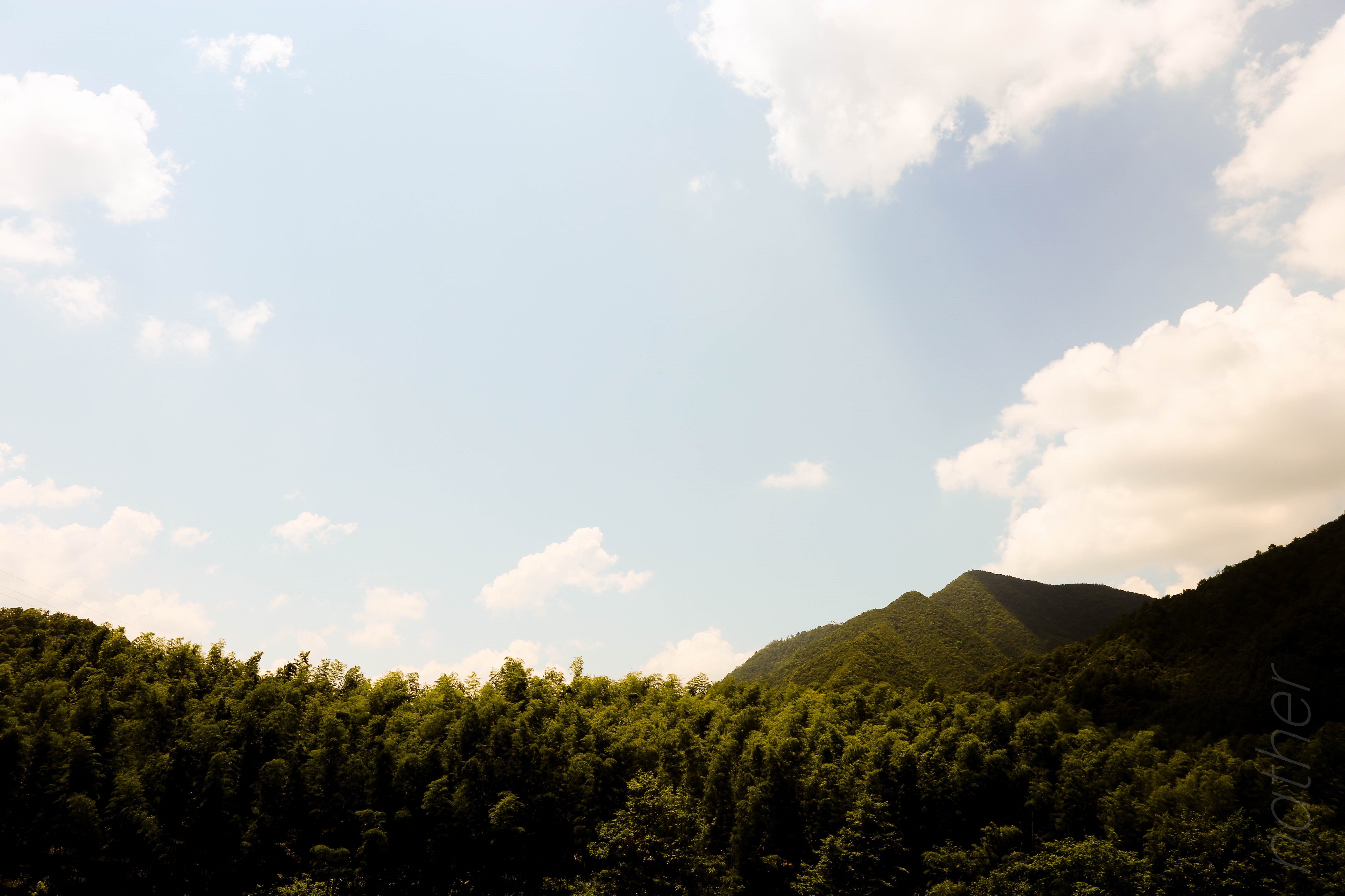 Green mountains and sky with clouds HD Wallpaper