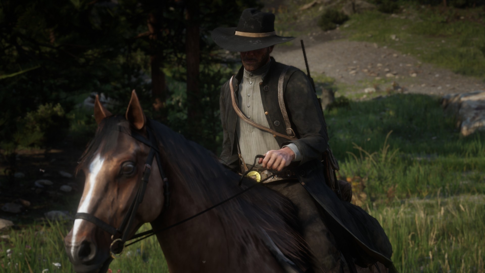 Man in hat riding a horse in Red Dead Redemption 2 HD Wallpaper