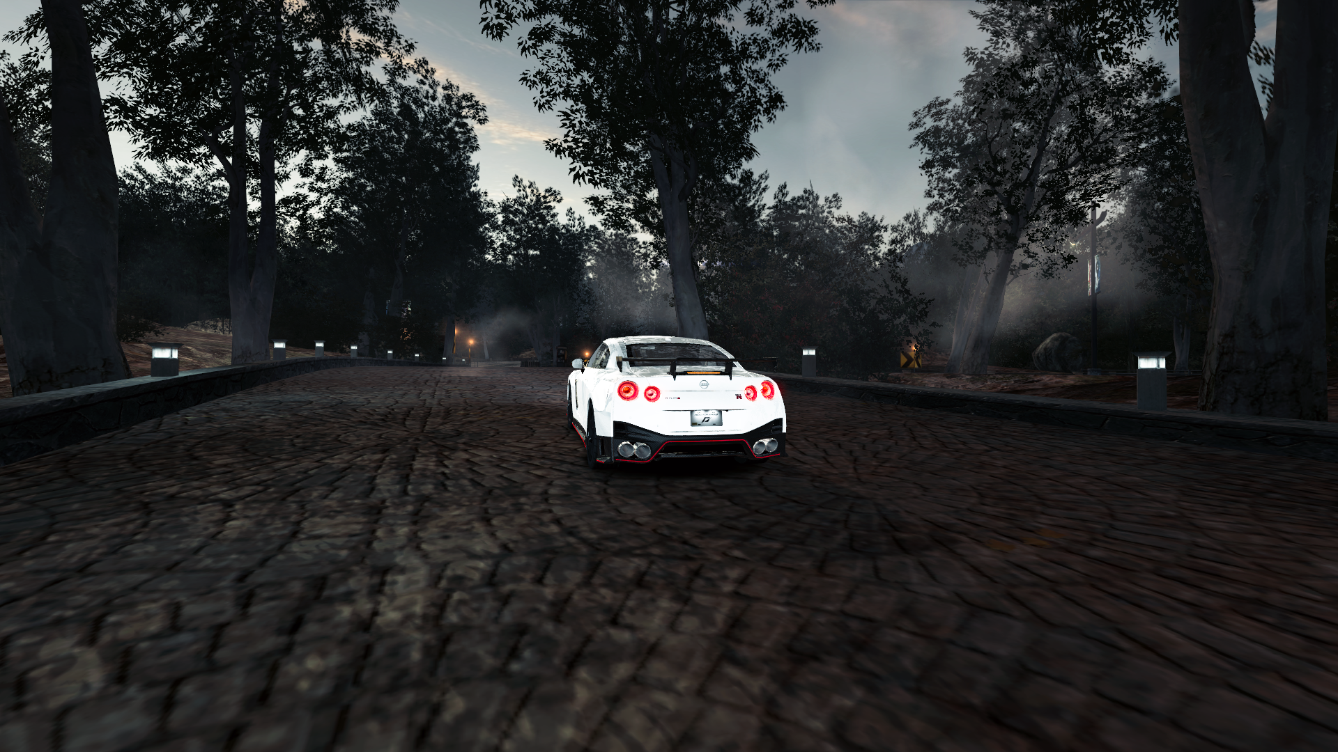 Nissan GT-R NISMO on a cobblestone road HD Wallpaper