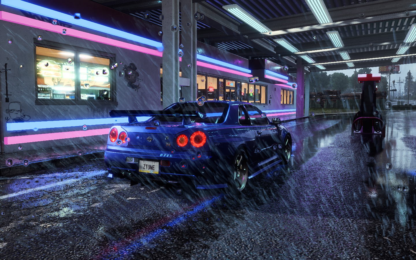Nissan Skyline R34 in the rain at a gas station HD Wallpaper