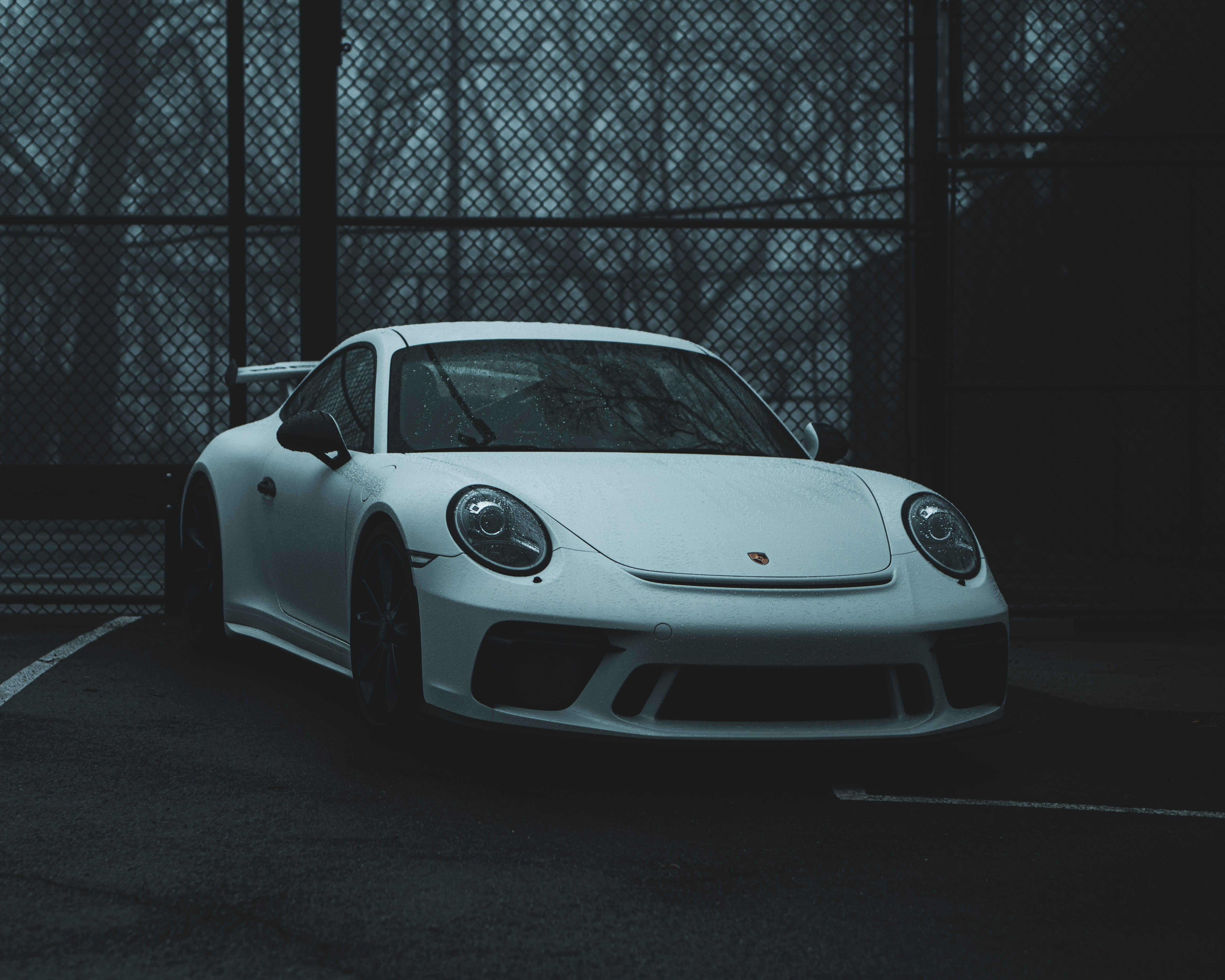White Porsche 911 GT3 parked near a fence HD Wallpaper