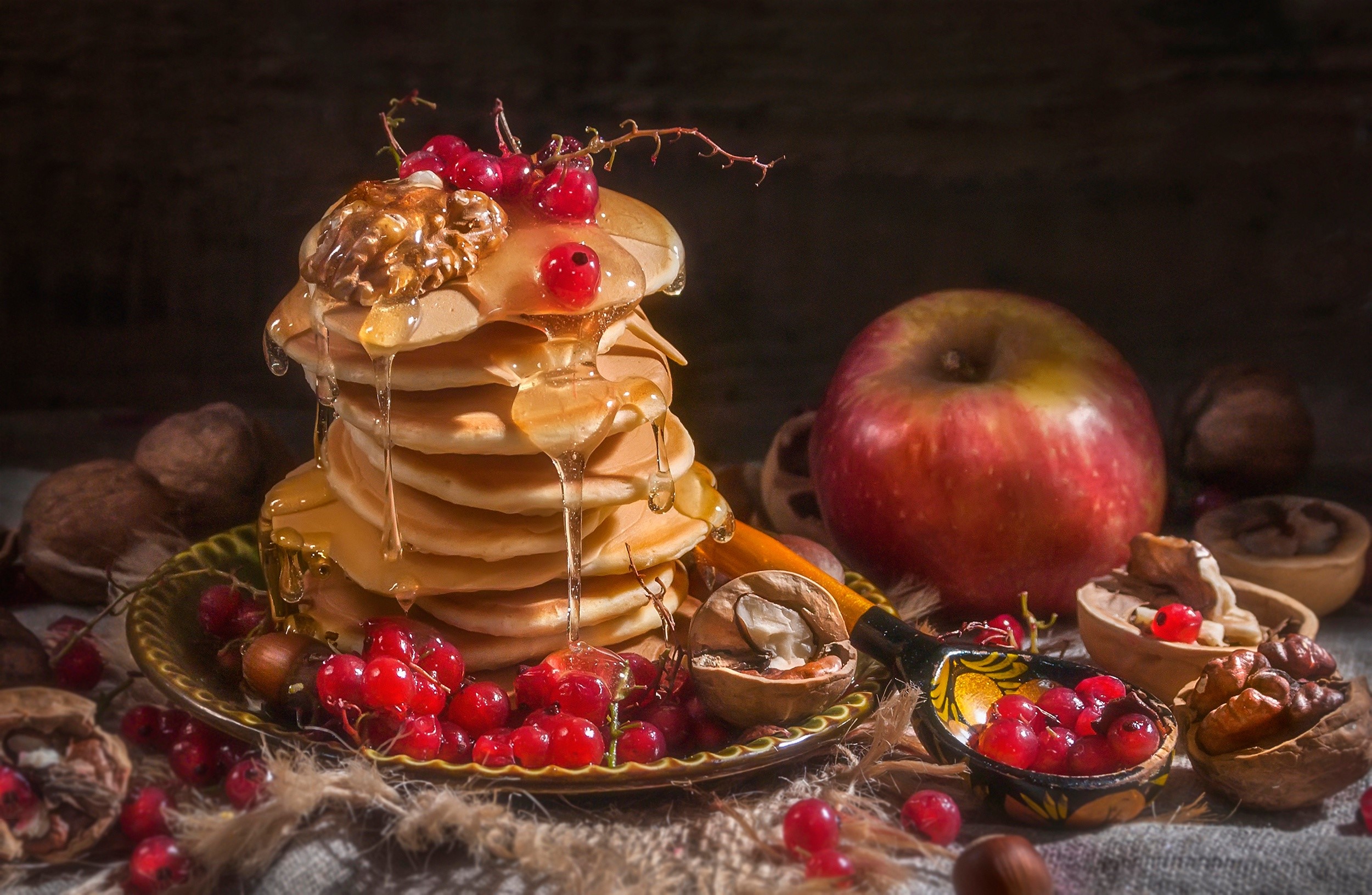 Stack of pancakes with honey, berries, walnuts, and apple HD Wallpaper