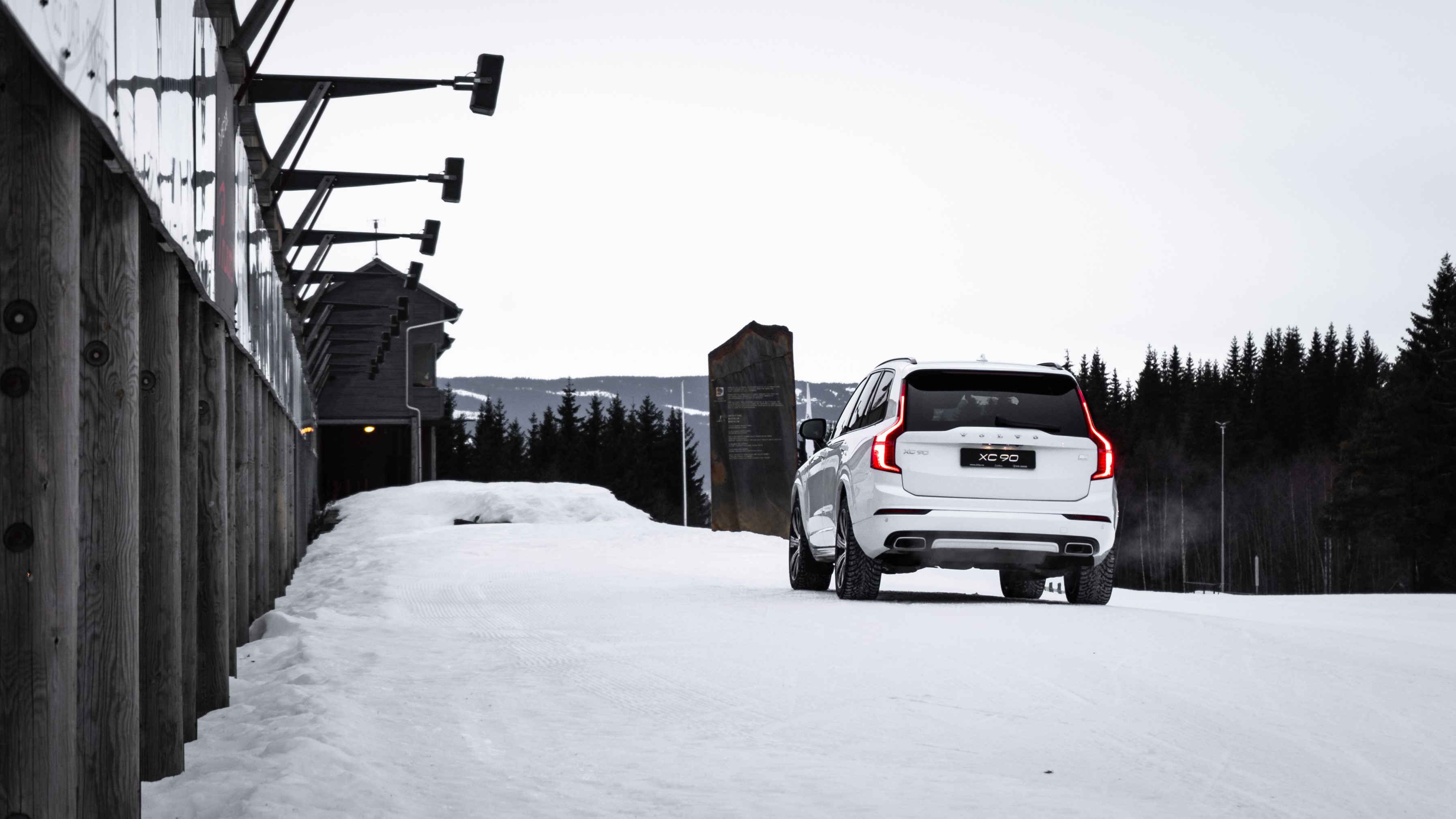 White Volvo XC90 in Snowy Landscape HD Wallpaper