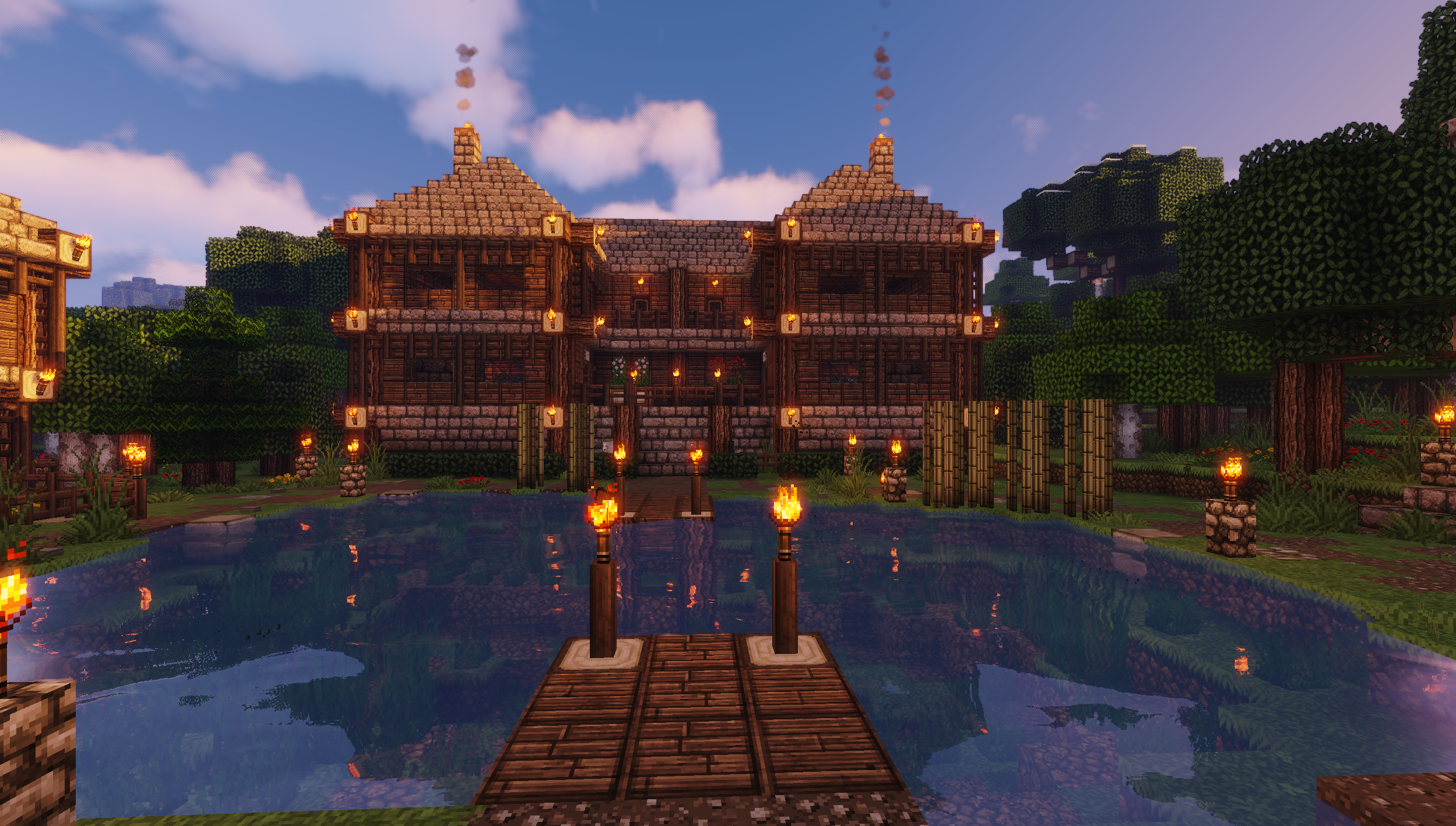 Minecraft house by a lake with torches and trees HD Wallpaper