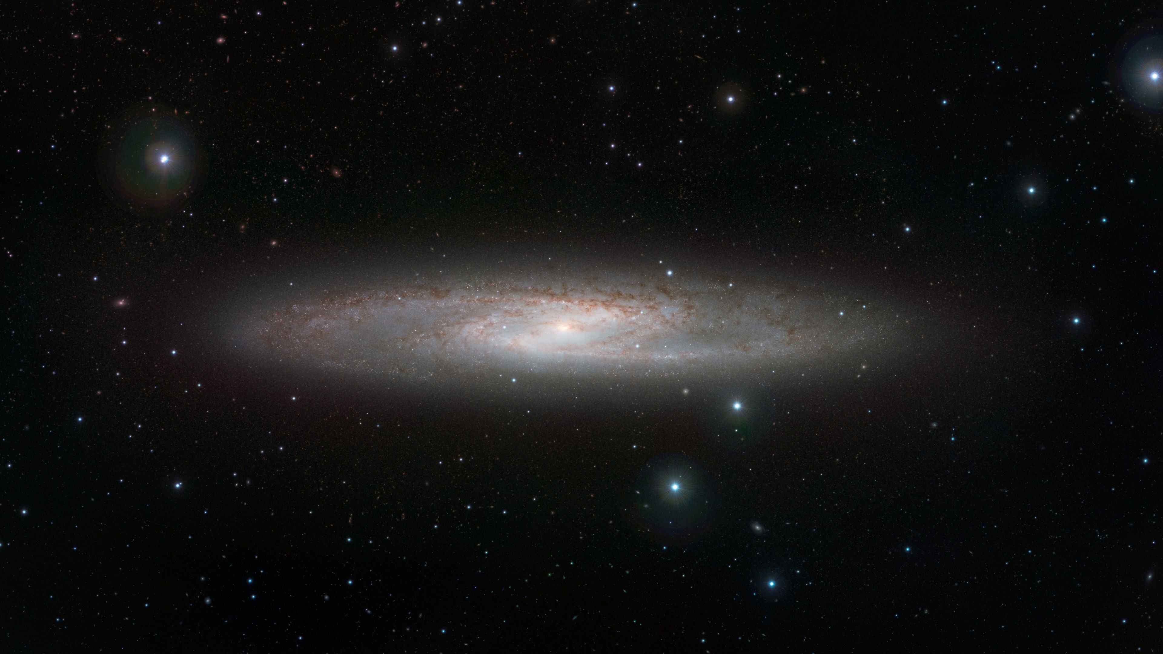 4K spiral galaxy in space with stars HD Wallpaper