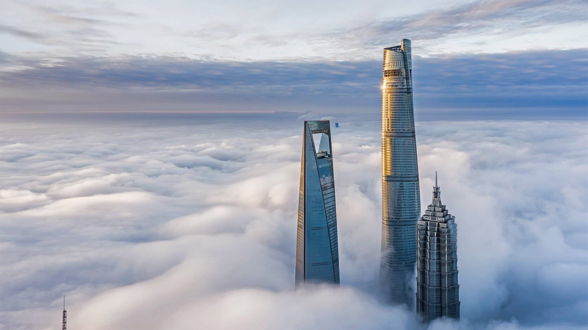 Shanghai skyscrapers above the clouds HD Wallpaper