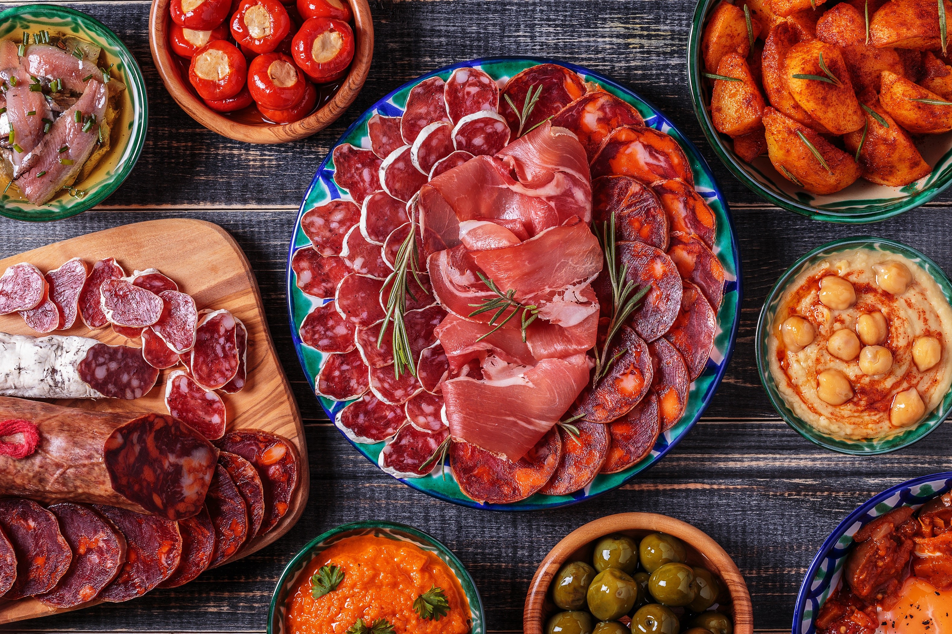 Assortment of Spanish Tapas and Charcuterie HD Wallpaper