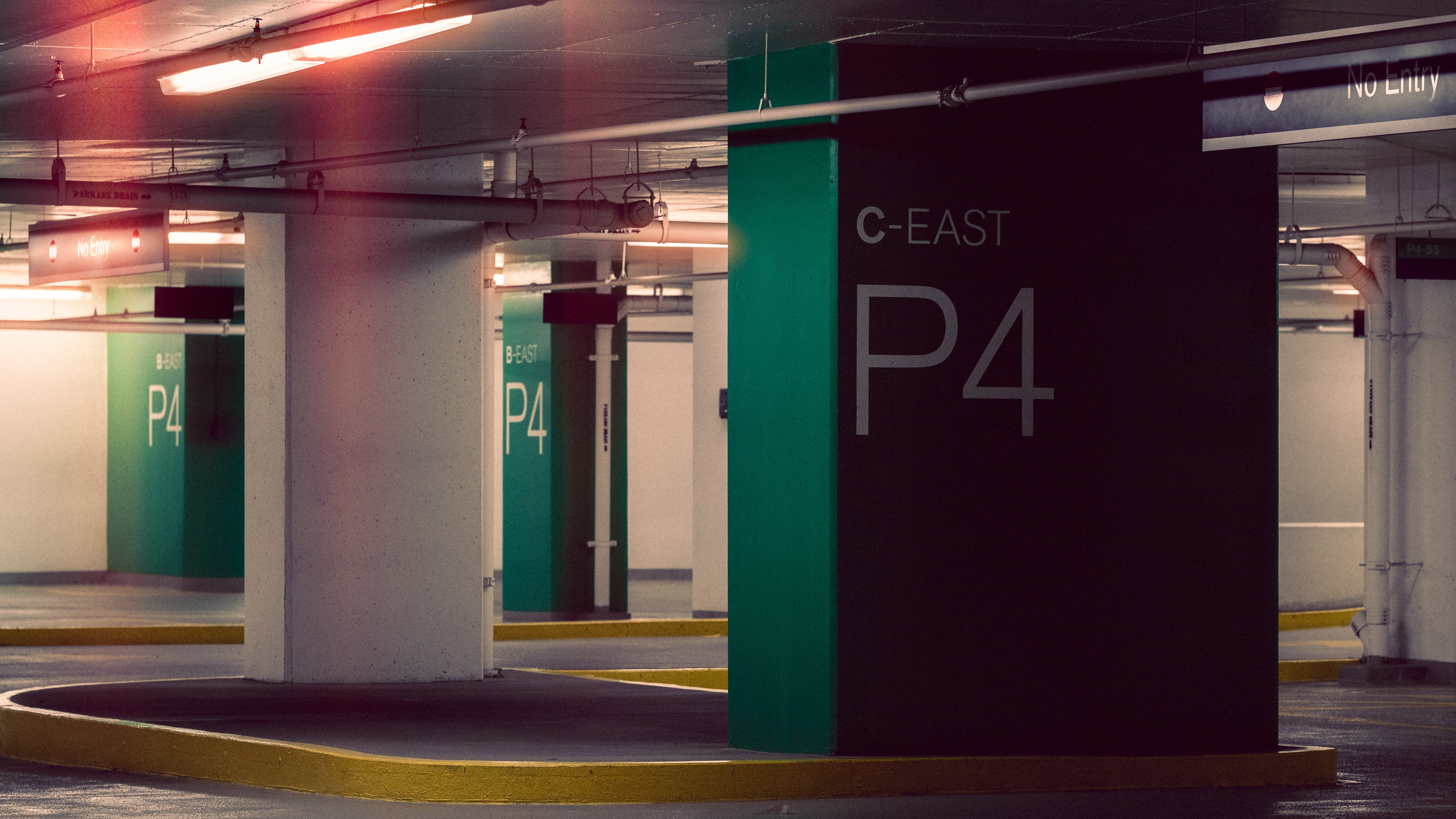 Parking garage with C-EAST P4 sign HD Wallpaper