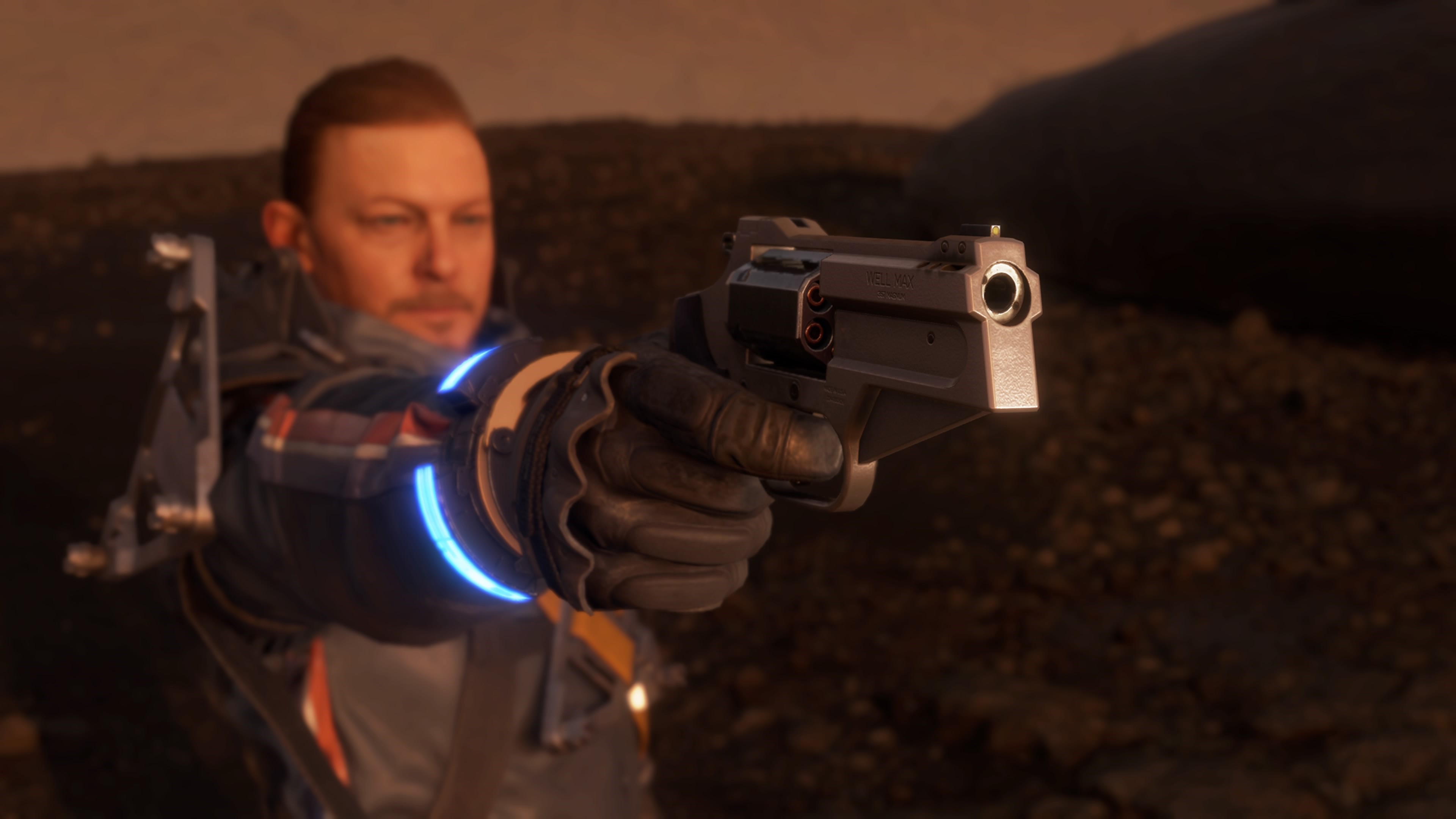Sam Porter Bridges from Death Stranding holding a gun HD Wallpaper