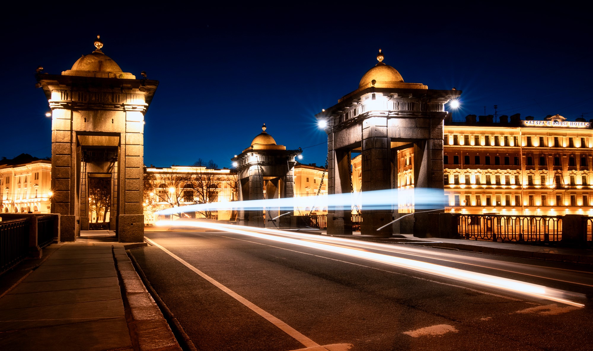 Night cityscape with light trails on a bridge HD Wallpaper