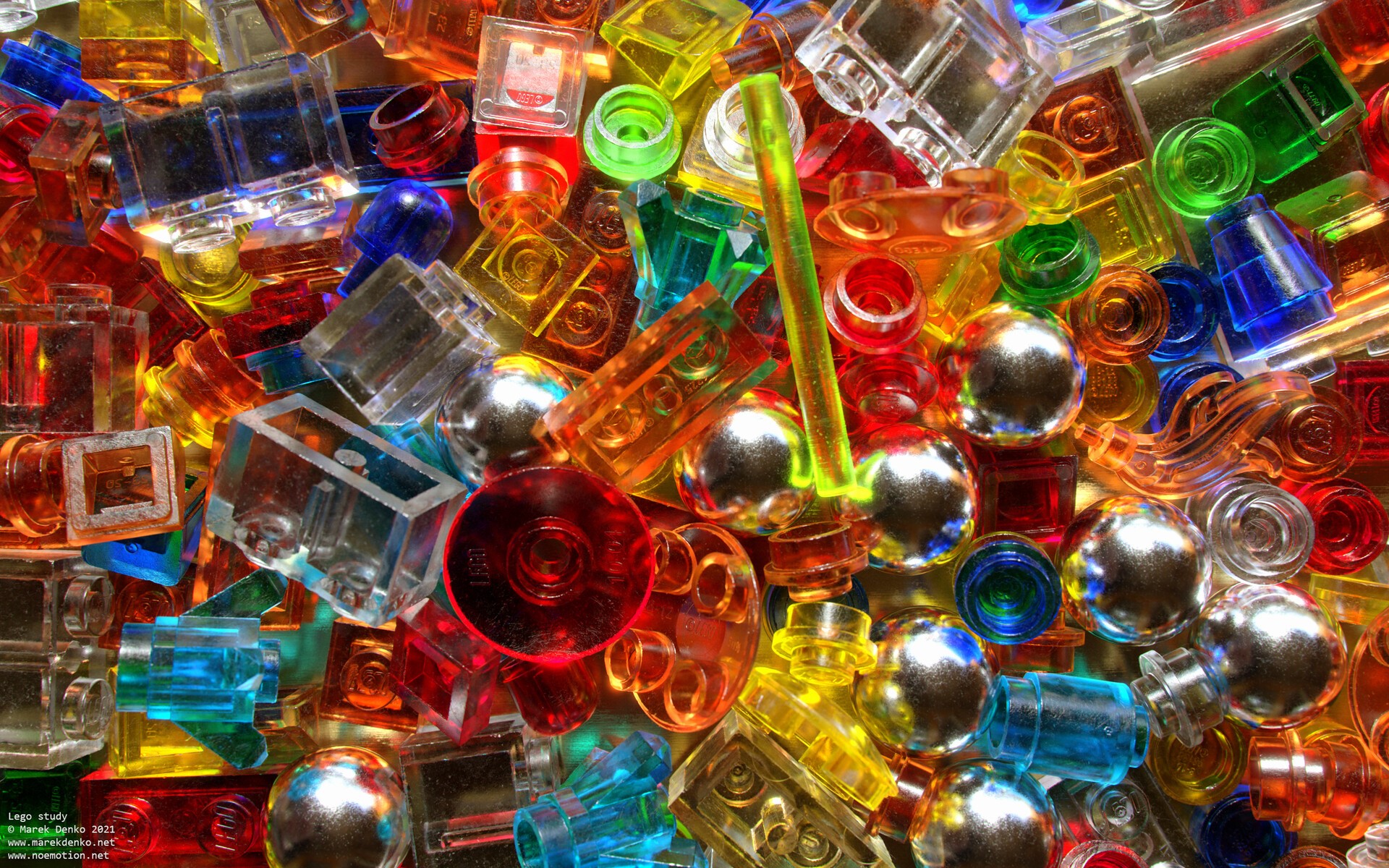 A pile of colorful transparent Lego bricks and pieces HD Wallpaper