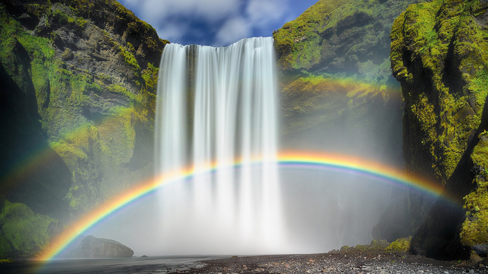 Skogafoss waterfall with a rainbow in Iceland HD Wallpaper