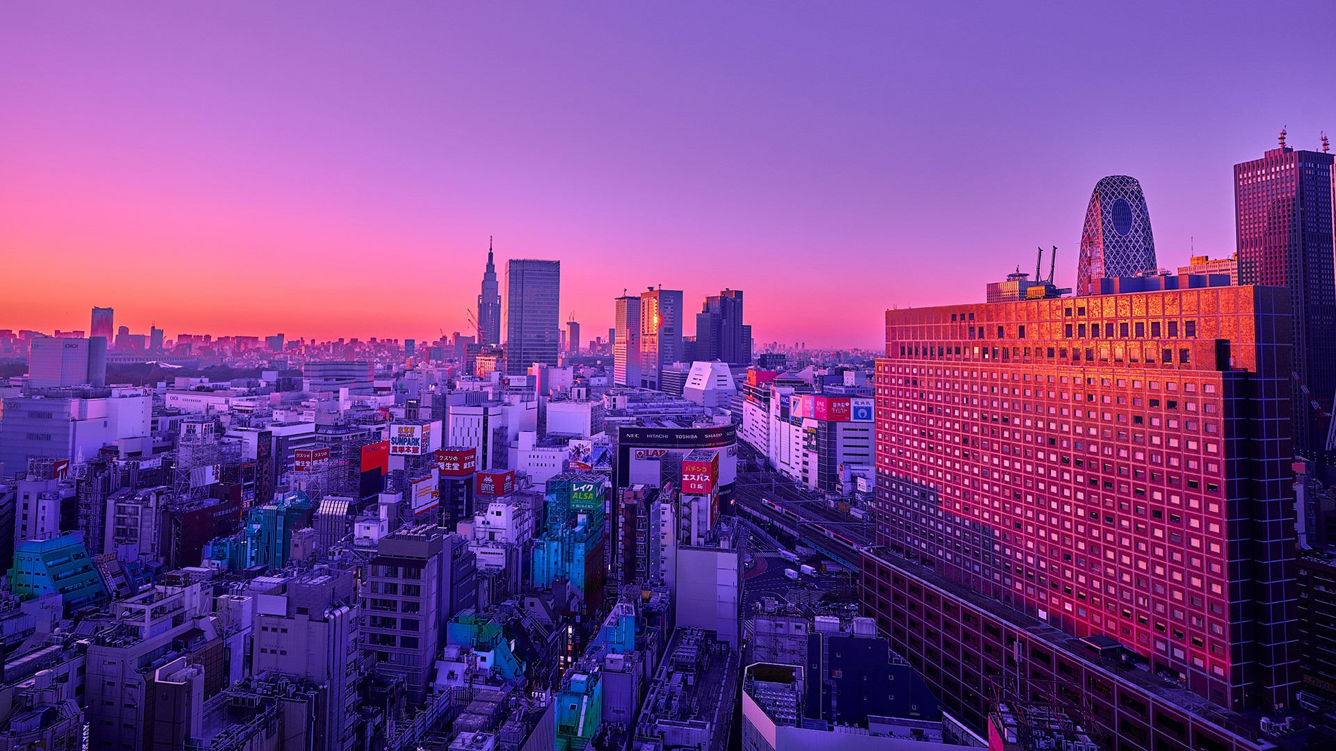 Cityscape at sunset with skyscrapers HD Wallpaper