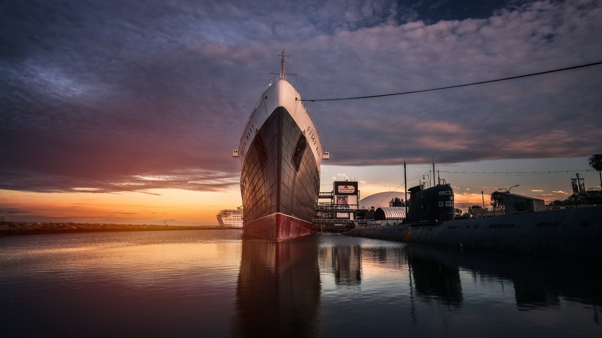 Queen Mary ship and submarine at sunset in Long Beach harbor HD Wallpaper