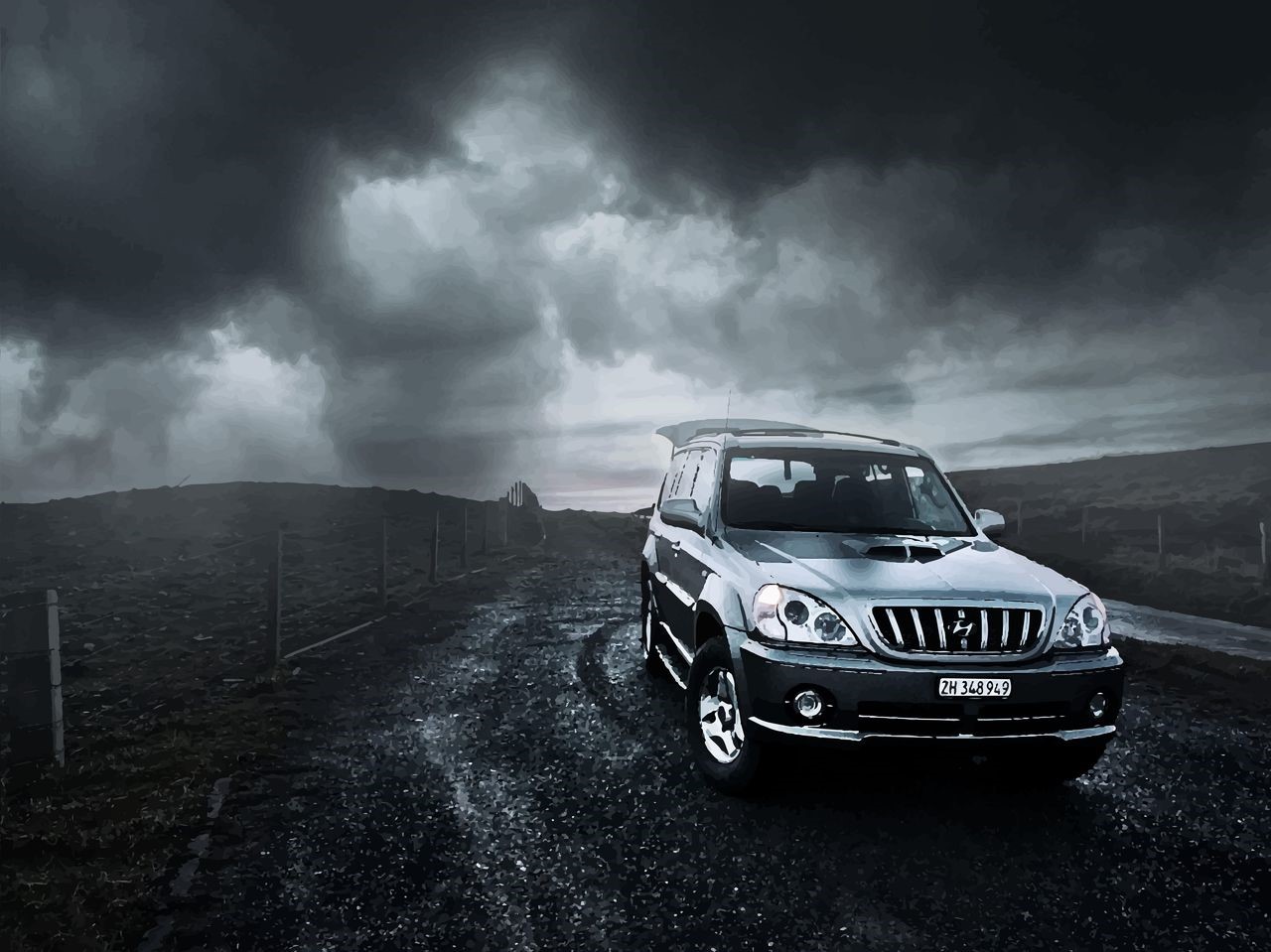 Hyundai SUV on a dirt road under stormy clouds HD Wallpaper