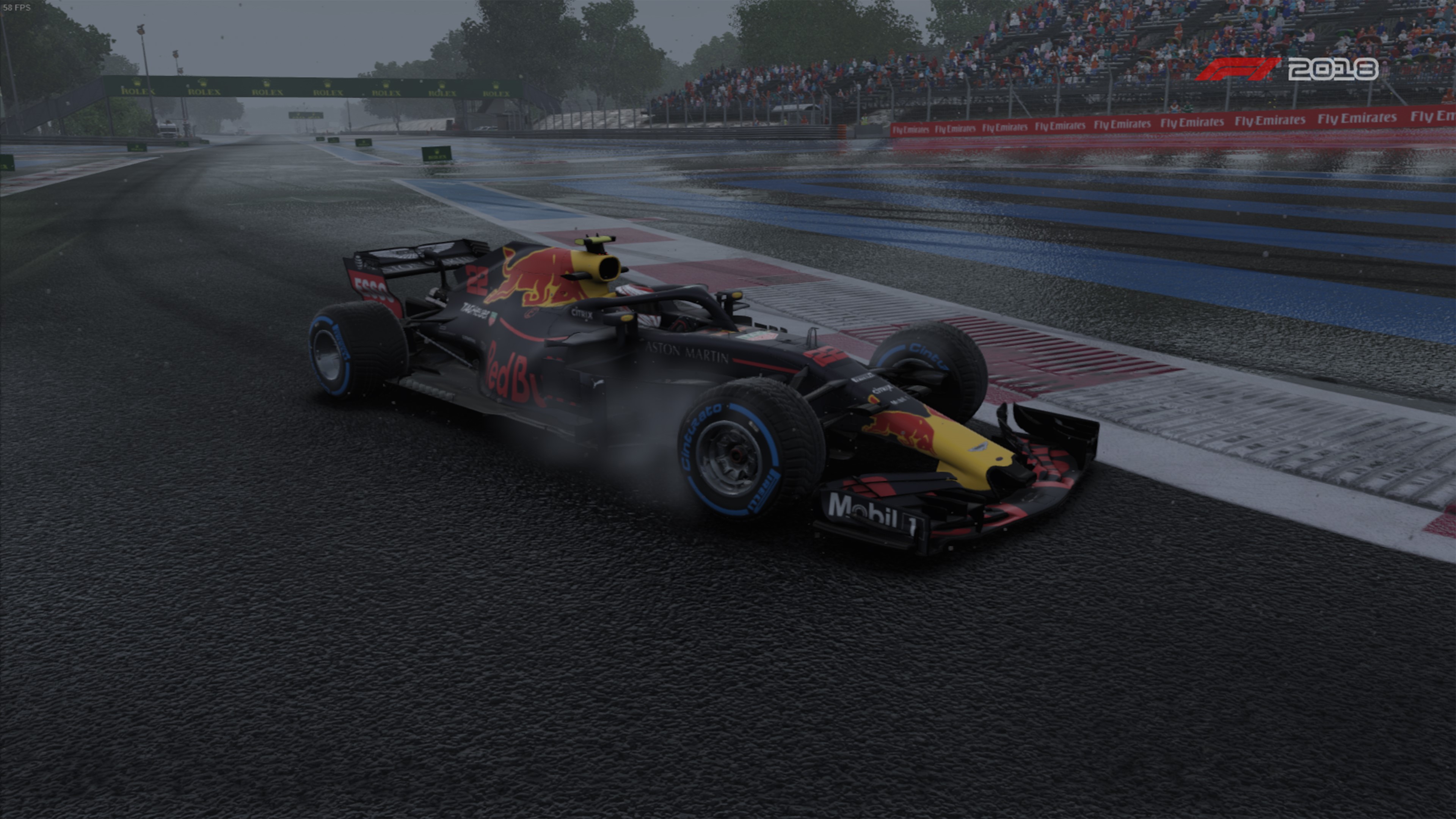 Red Bull Formula 1 car racing in the rain HD Wallpaper