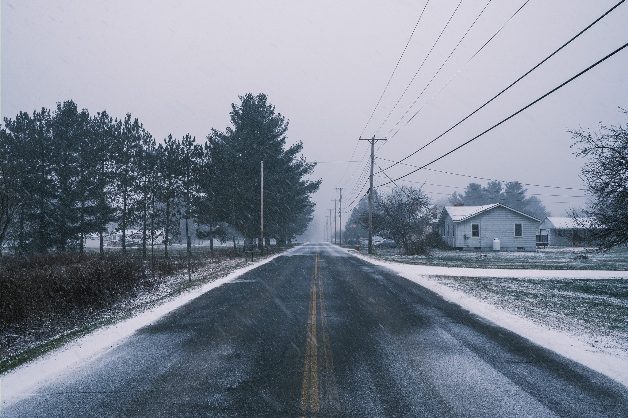 Winter road with snow and houses HD Wallpaper