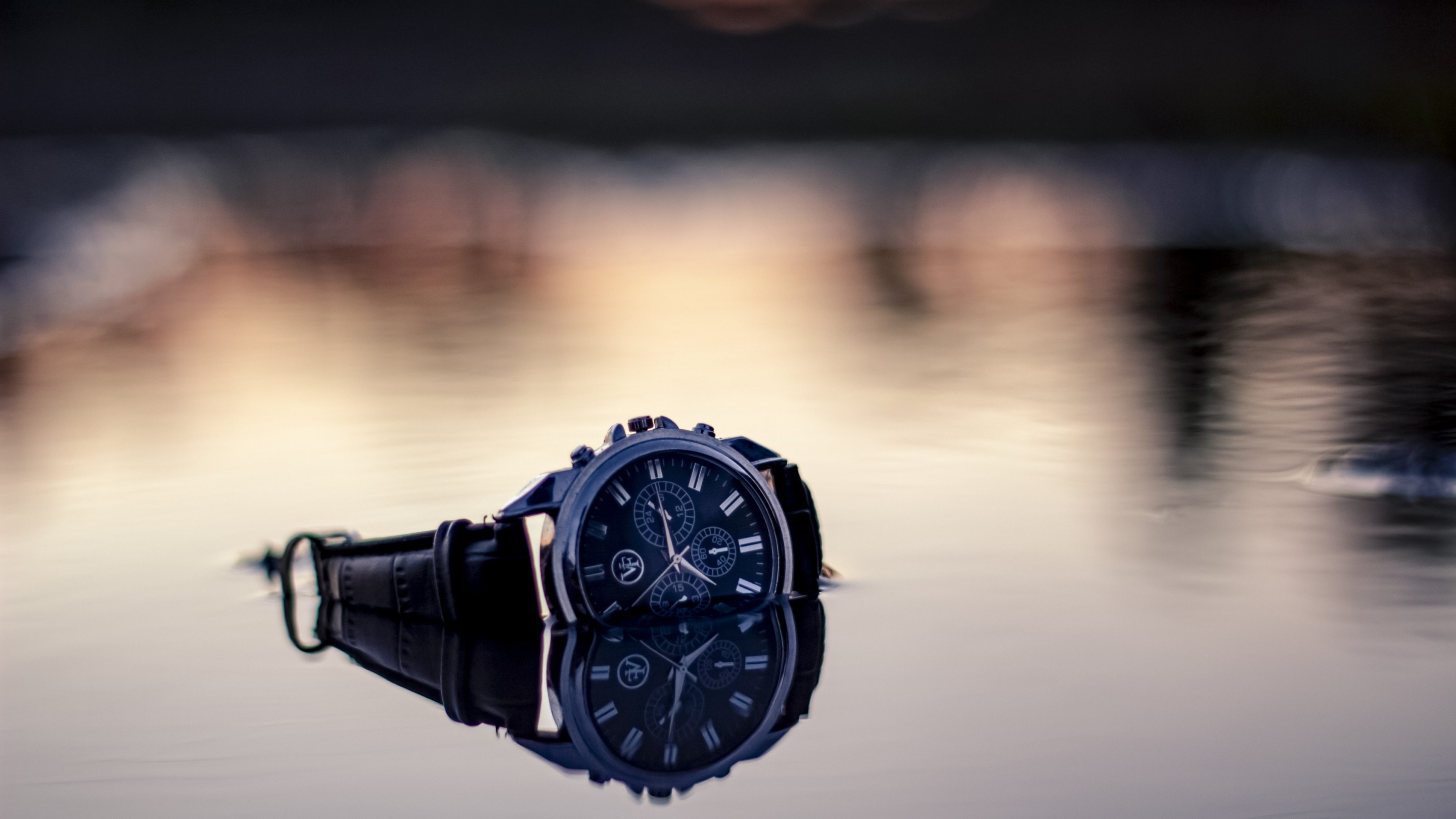 Watch submerged in water with reflection HD Wallpaper
