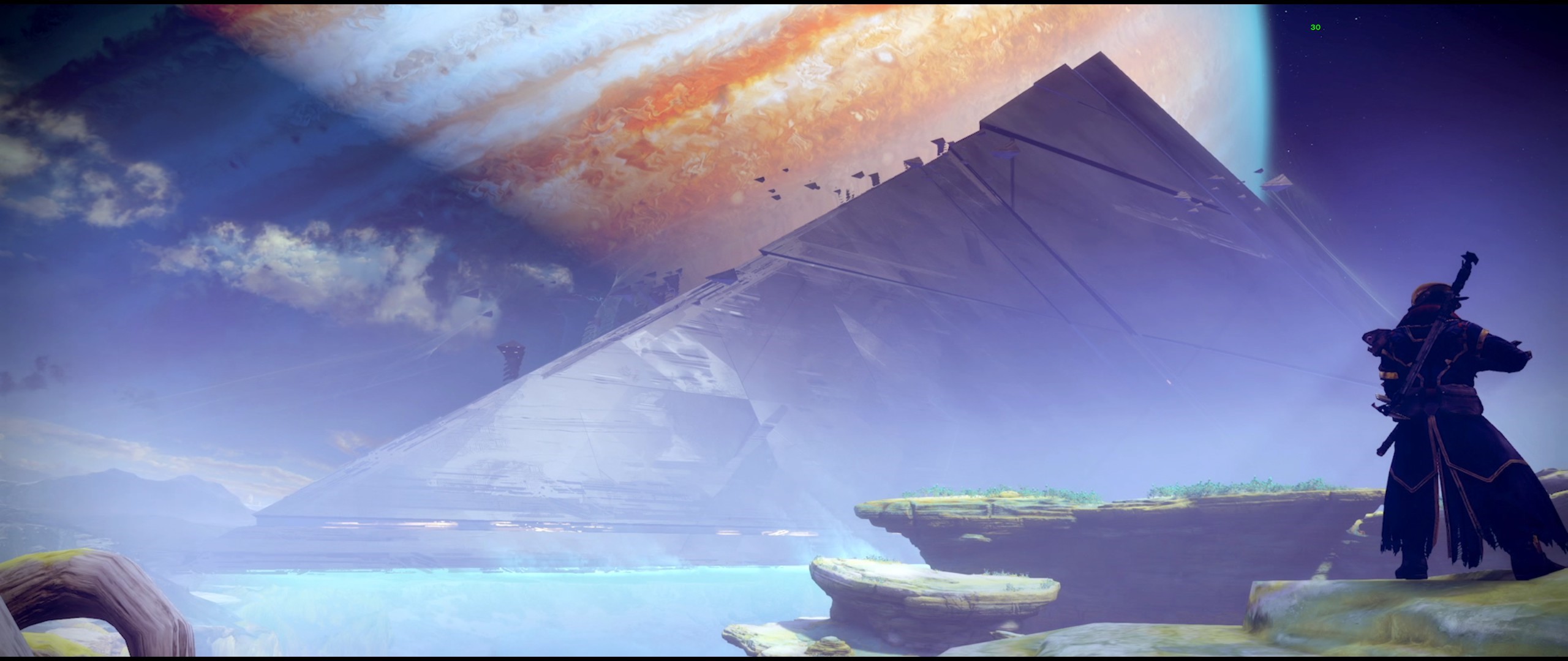 Guardian in front of a Pyramid structure on a planet with a large gas giant HD Wallpaper