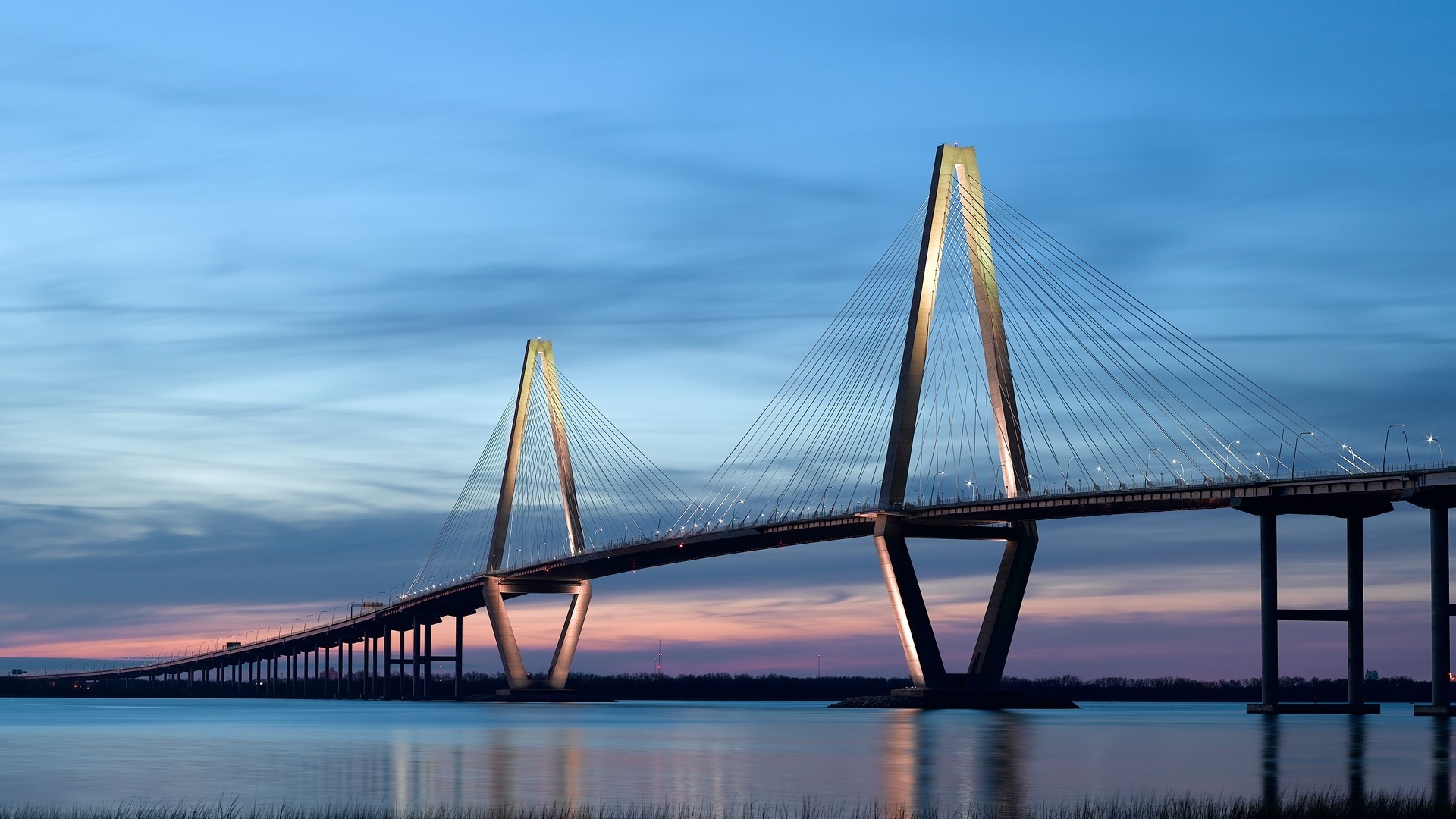 Arthur Ravenel Jr. Bridge over water at dusk HD Wallpaper