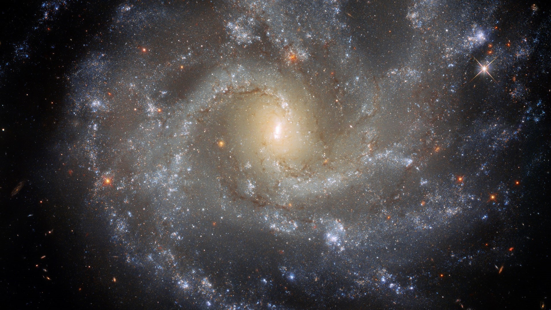 Spiral galaxy with bright core and star clusters HD Wallpaper