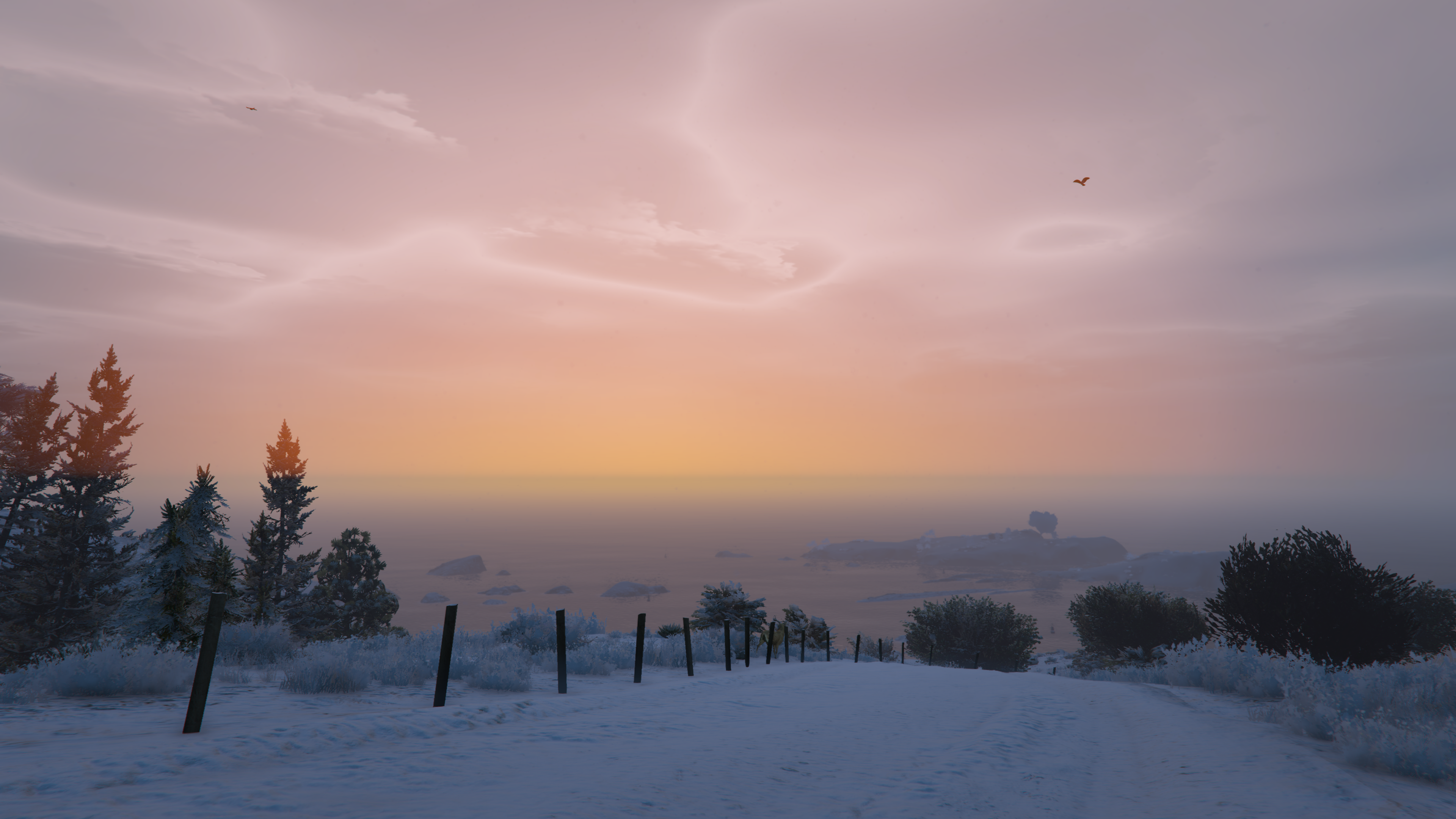 Sunset over snowy landscape with ocean view in Grand Theft Auto V HD Wallpaper