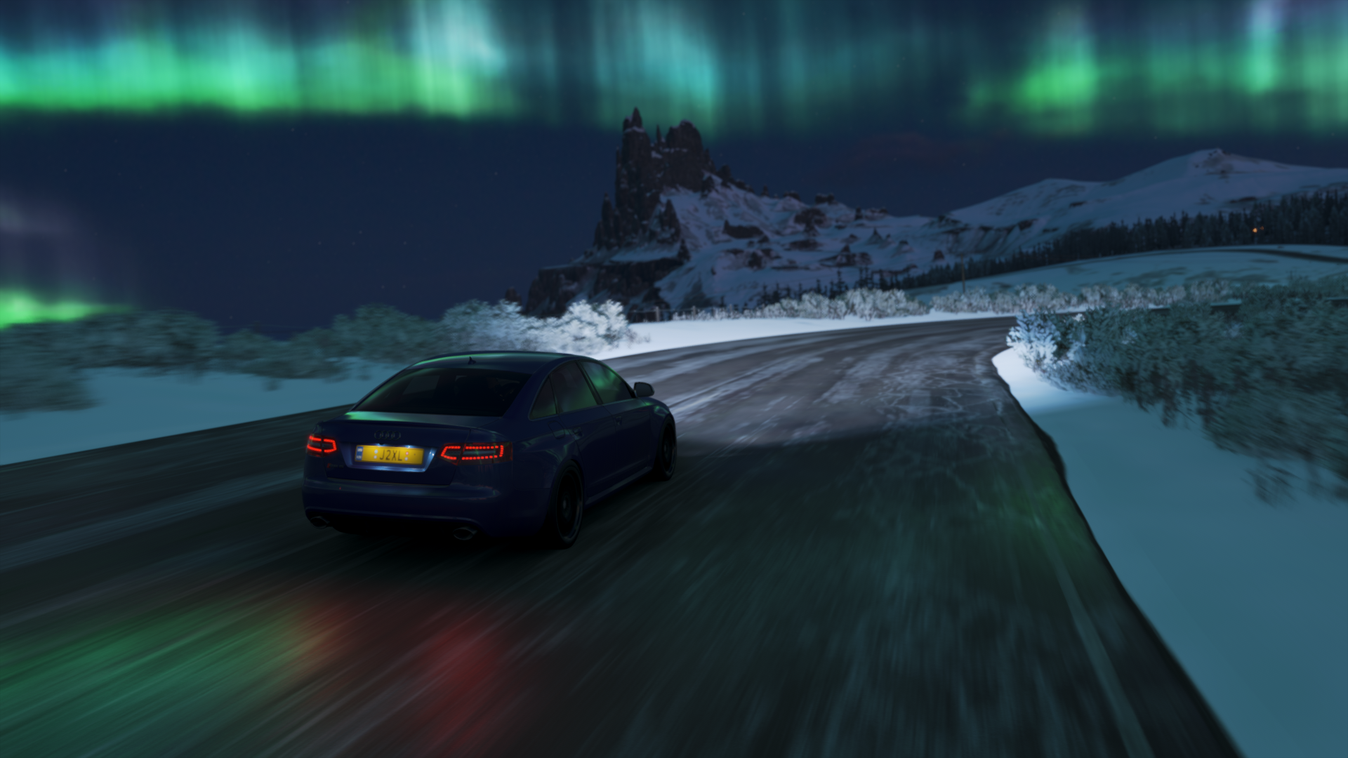 Audi RS6 driving on a snowy road under the Aurora Borealis HD Wallpaper