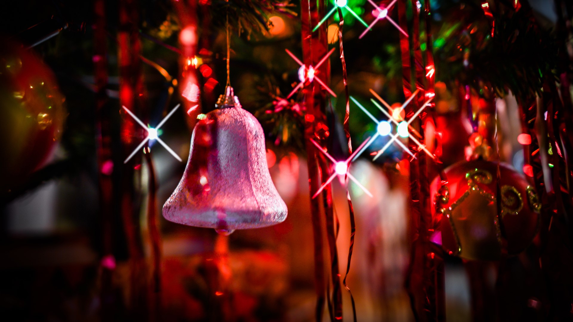Christmas ornaments and lights on a tree HD Wallpaper