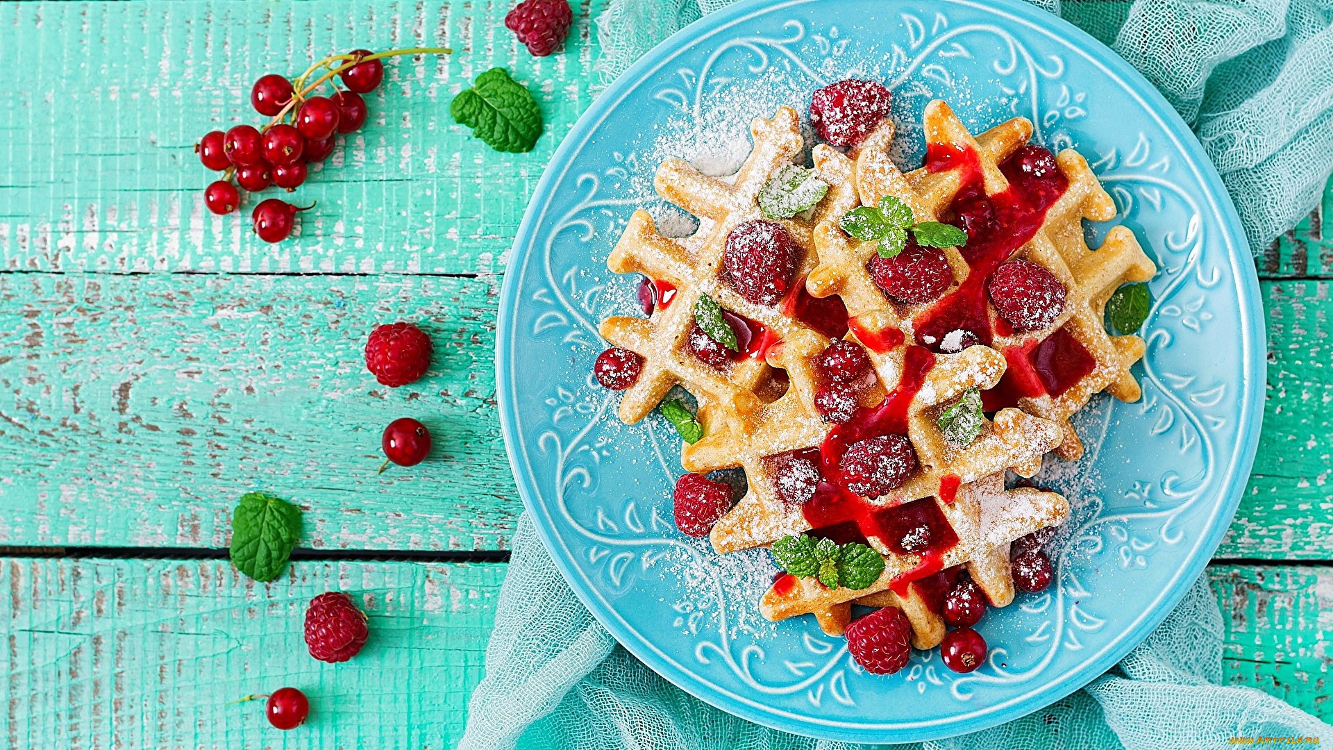 Waffles with raspberries and red currants on a blue plate HD Wallpaper