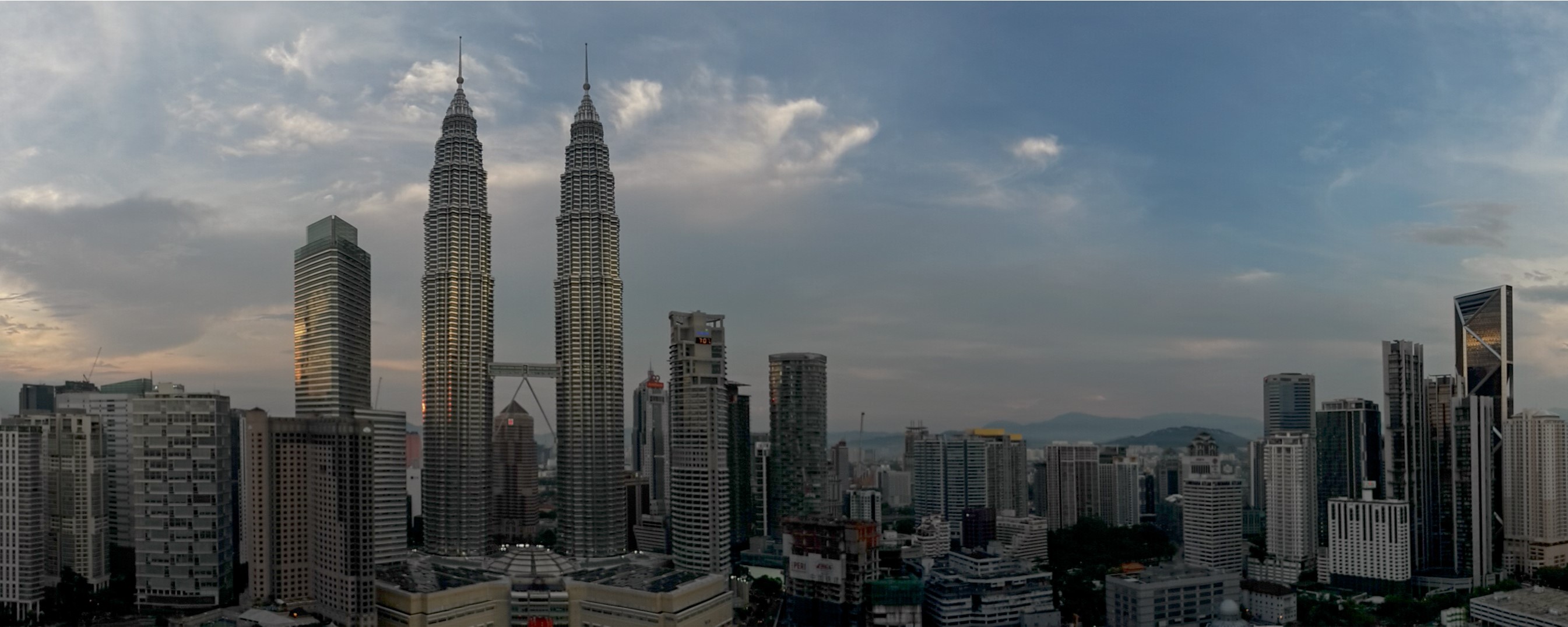 Skyline of Kuala Lumpur with Petronas Towers HD Wallpaper